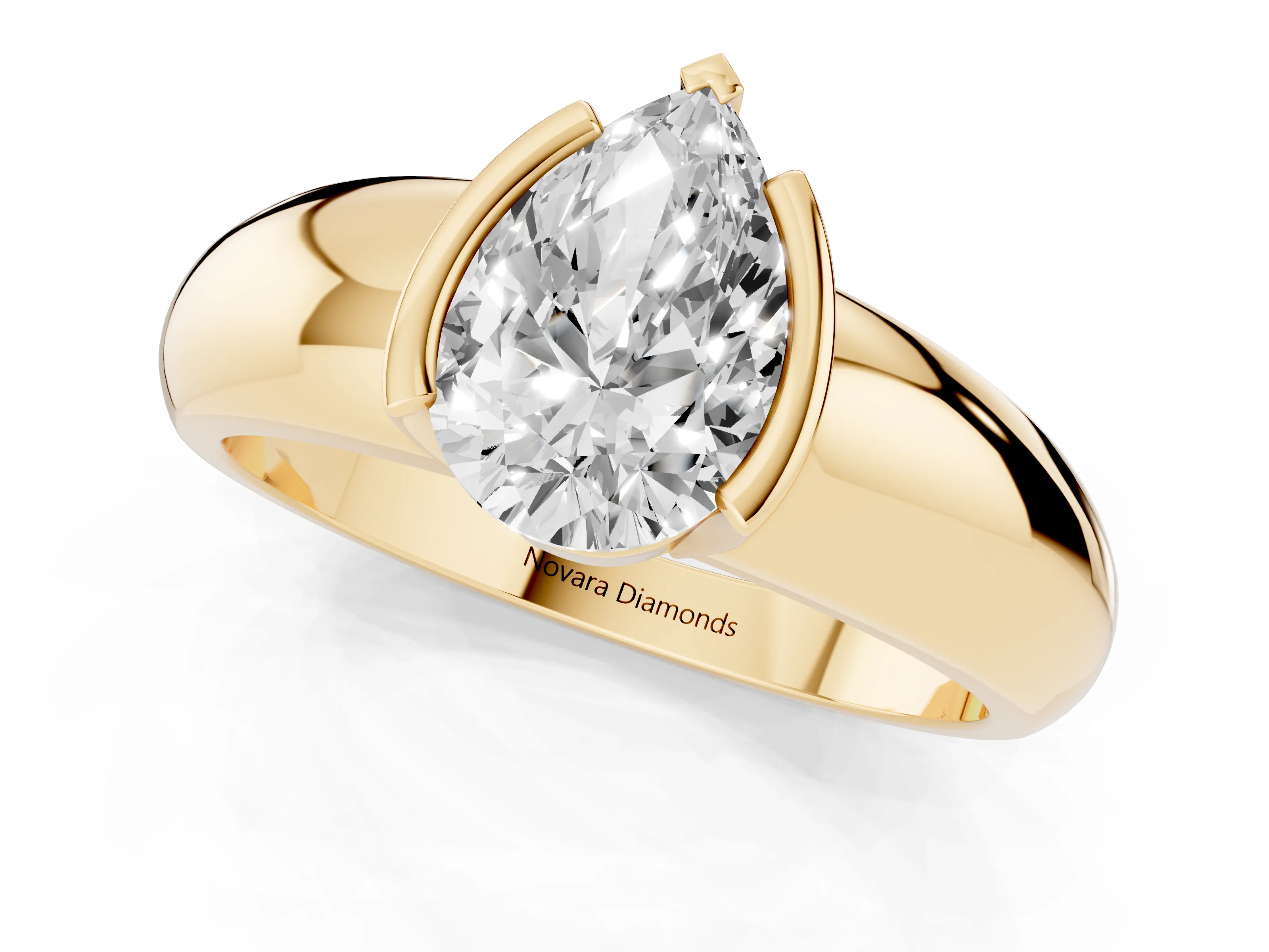 Pear Cut Diamond Solitaire Tension Set Ring Set in Yellow gold with Wide Band