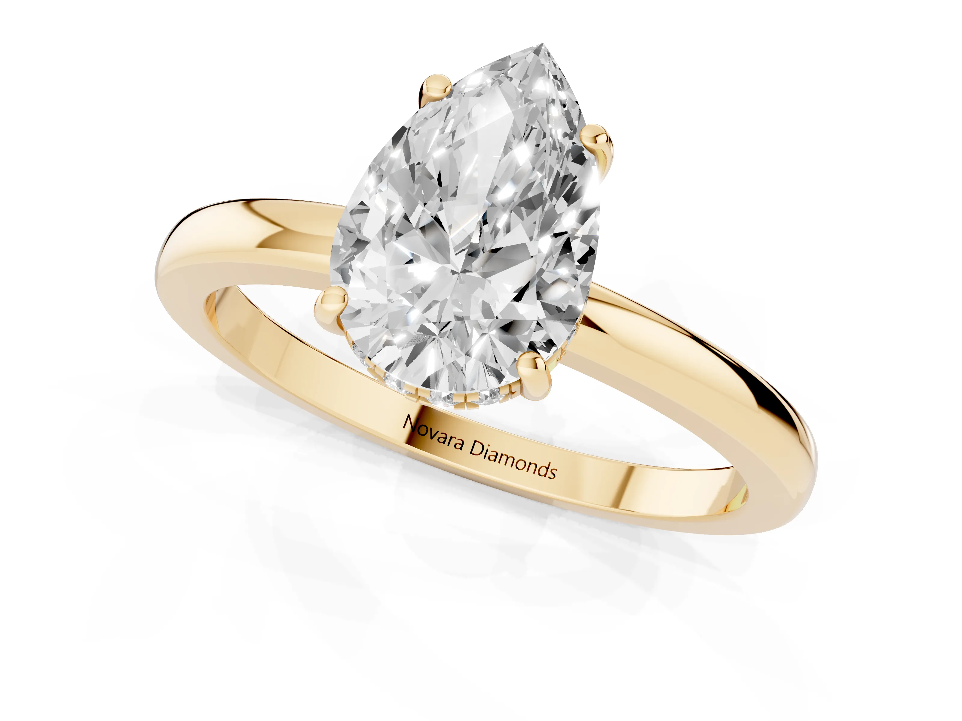 Pear Cut Diamond Solitaire Ring Set in Yellow gold with Plain Band and Prong Setting