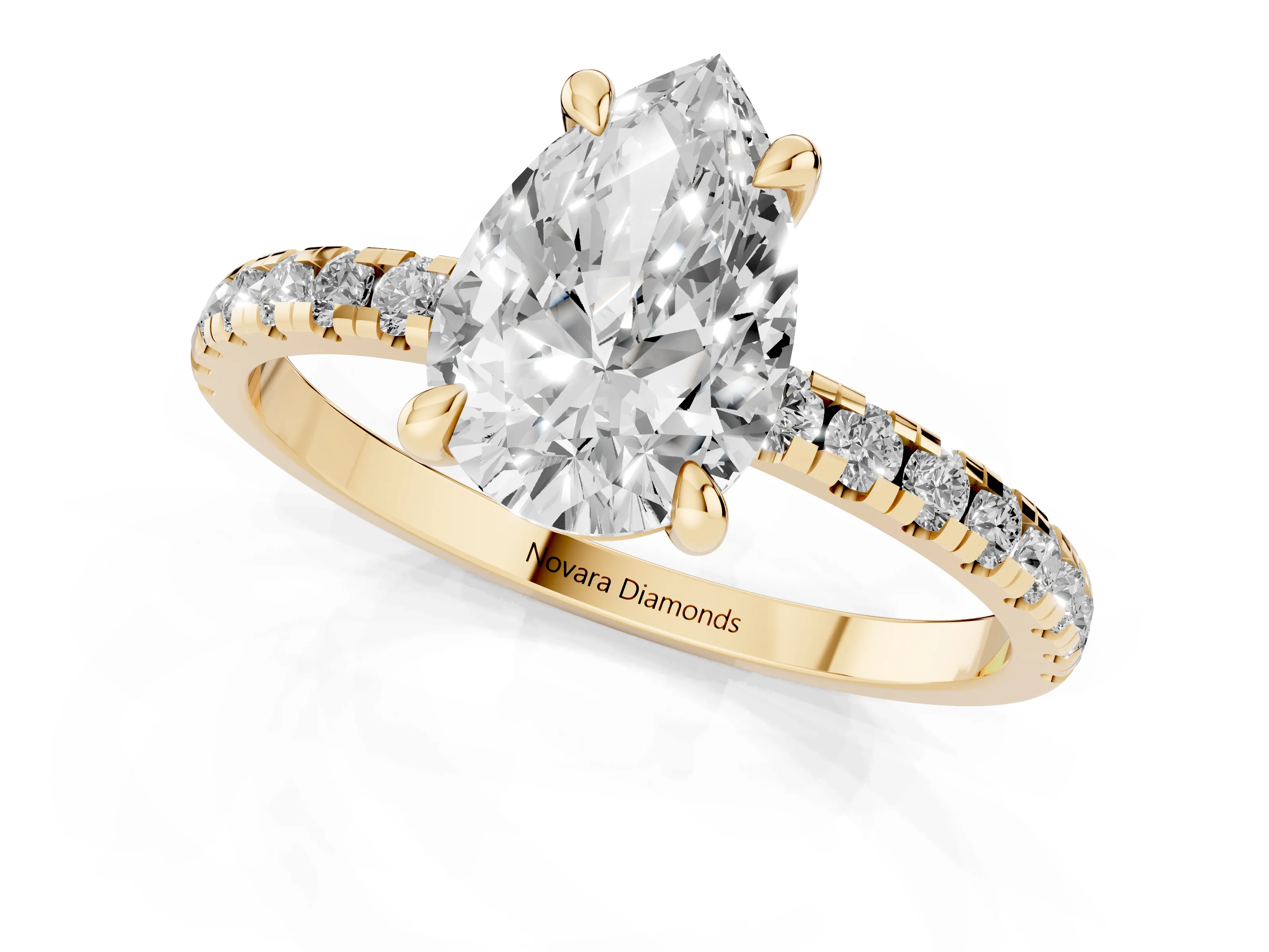 Pear Cut Diamond Brilliant Solitaire Ring Set in Yellow gold with Pavé Band and Prong Setting
