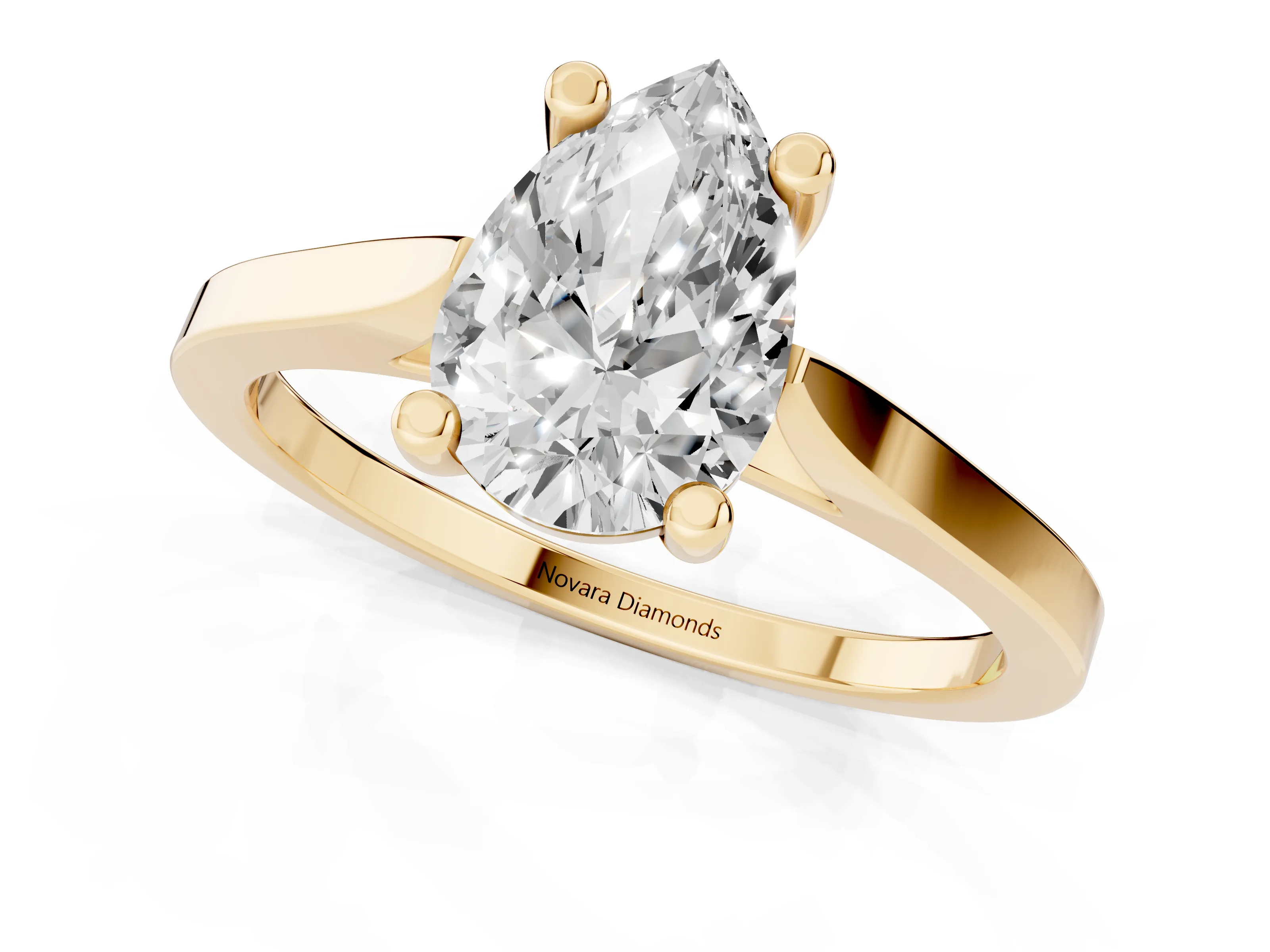 Pear Cut Diamond Solitaire Ring Set in Yellow gold with Prong Setting and Tapered Band
