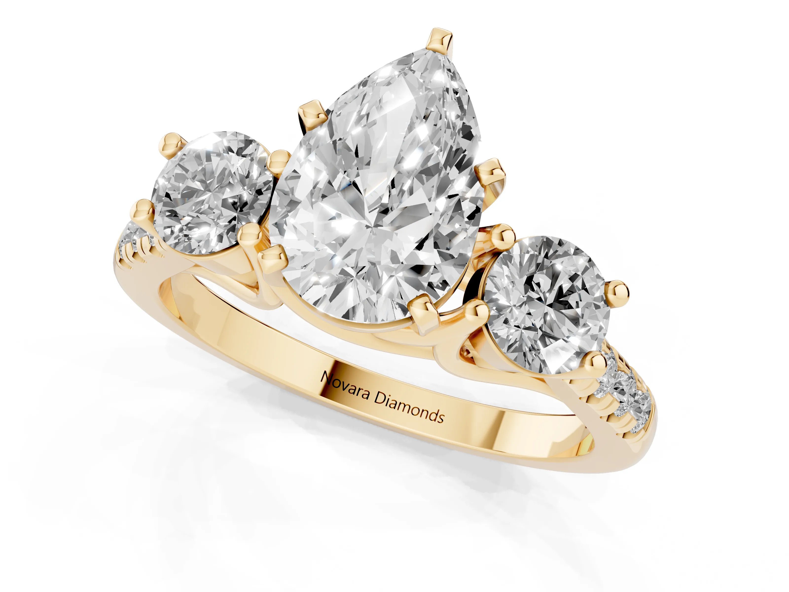 Three-Stone Pear Cut Diamond Pavé Band Ring Set in Yellow gold with Prong-Set Trio