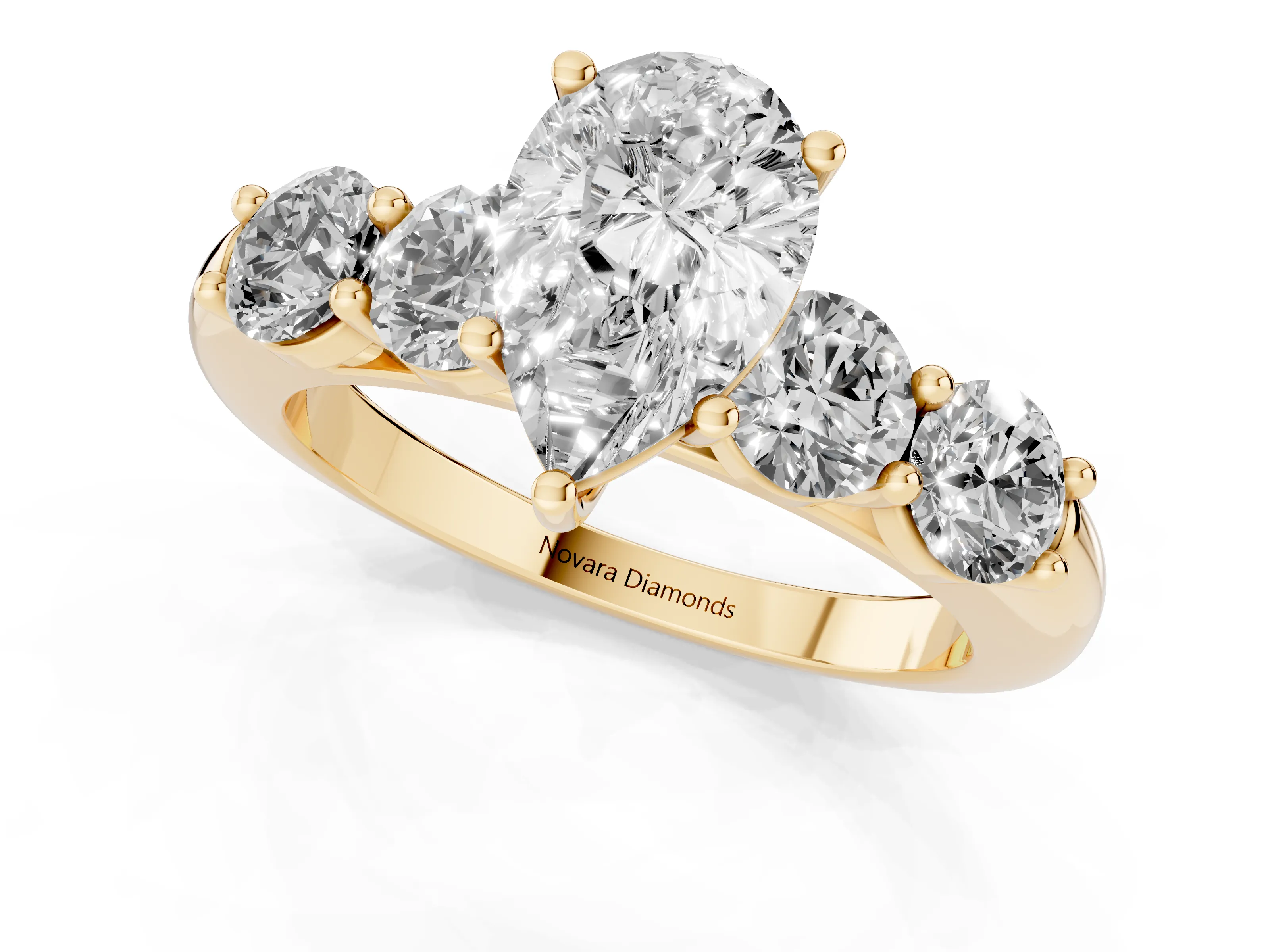 Pear Cut Diamond Five-Stone Prong Set Ring Set in Yellow gold with Classic Band
