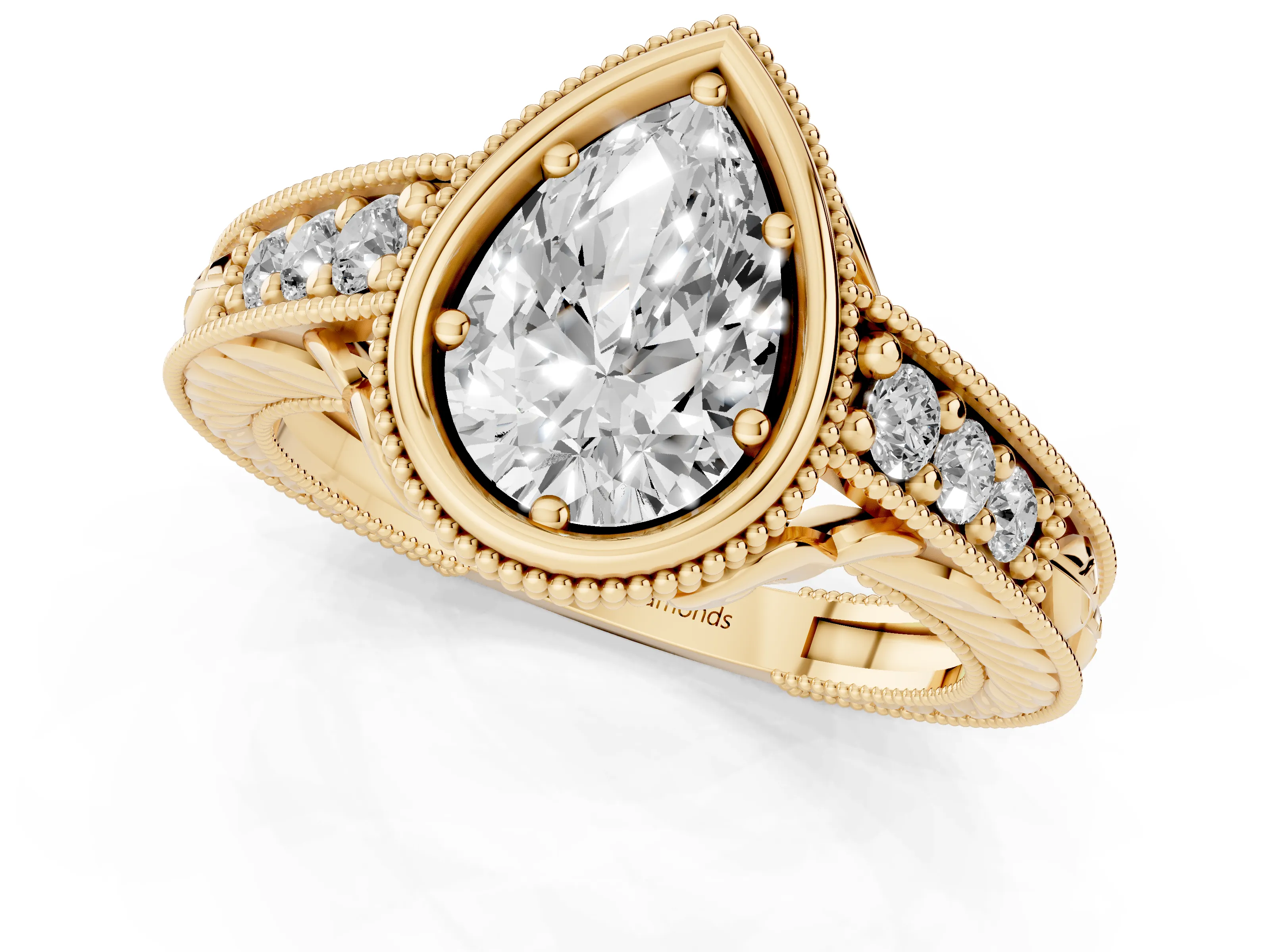 Bezel Set Pear Cut Diamond Milgrain Pavé Engagement Ring Set in Yellow gold