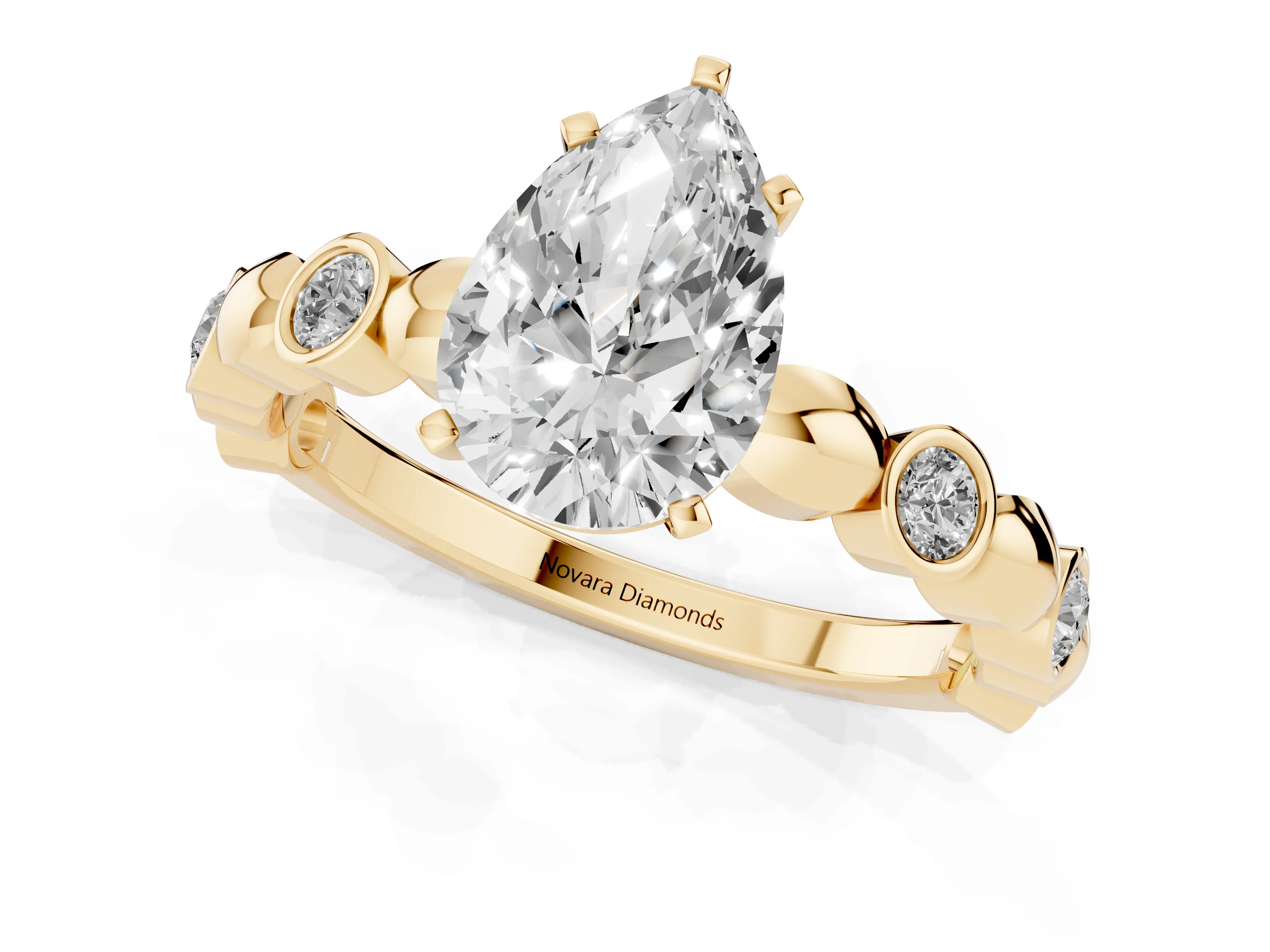 Pear Cut Diamond Solitaire Ring Set in Yellow gold with Bezel-Set Accents on Beaded Band and Prong Setting
