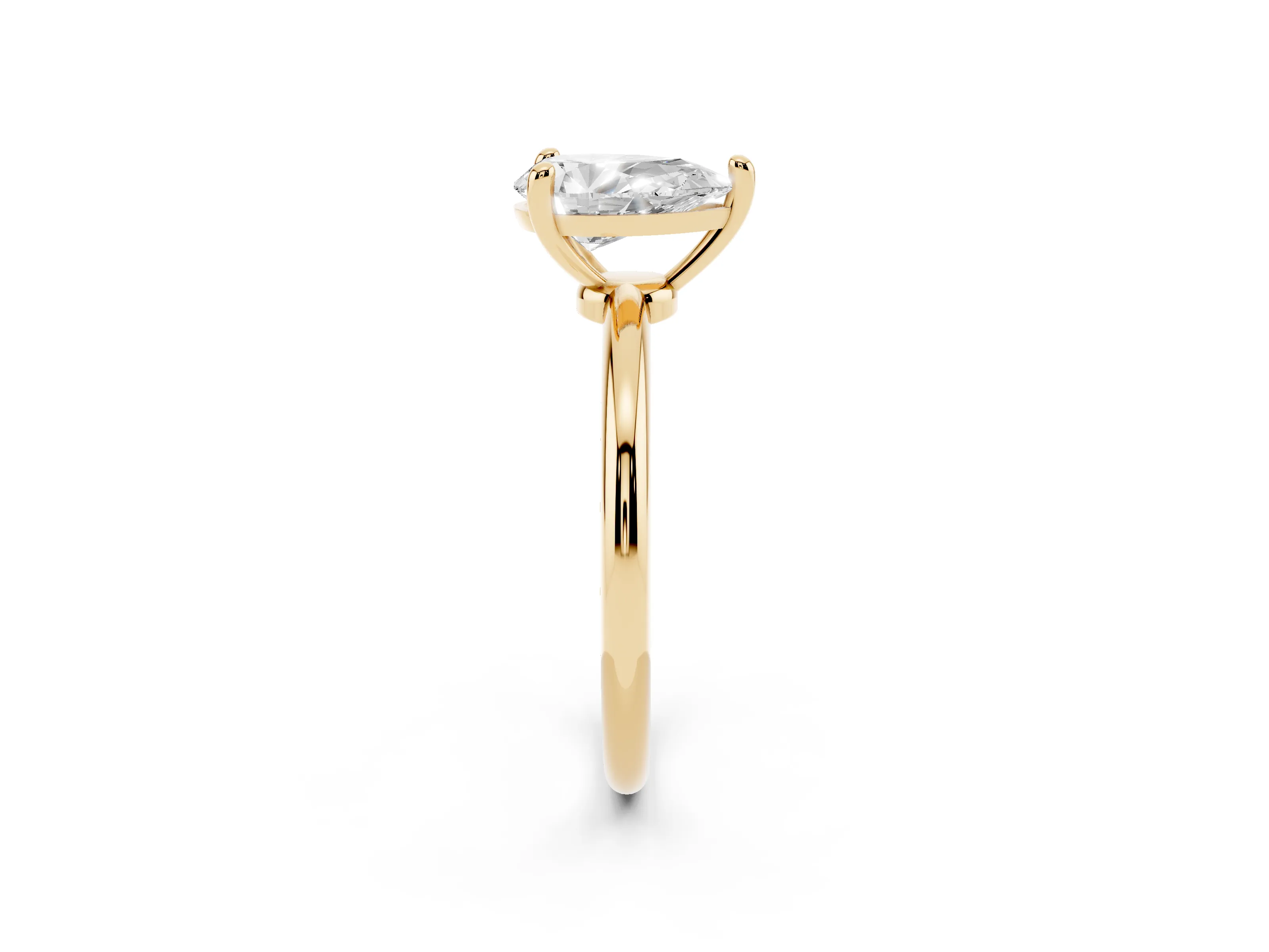 Pear Cut Diamond Solitaire Ring Set in Yellow gold with Secure Prong Setting on a Classic Band
