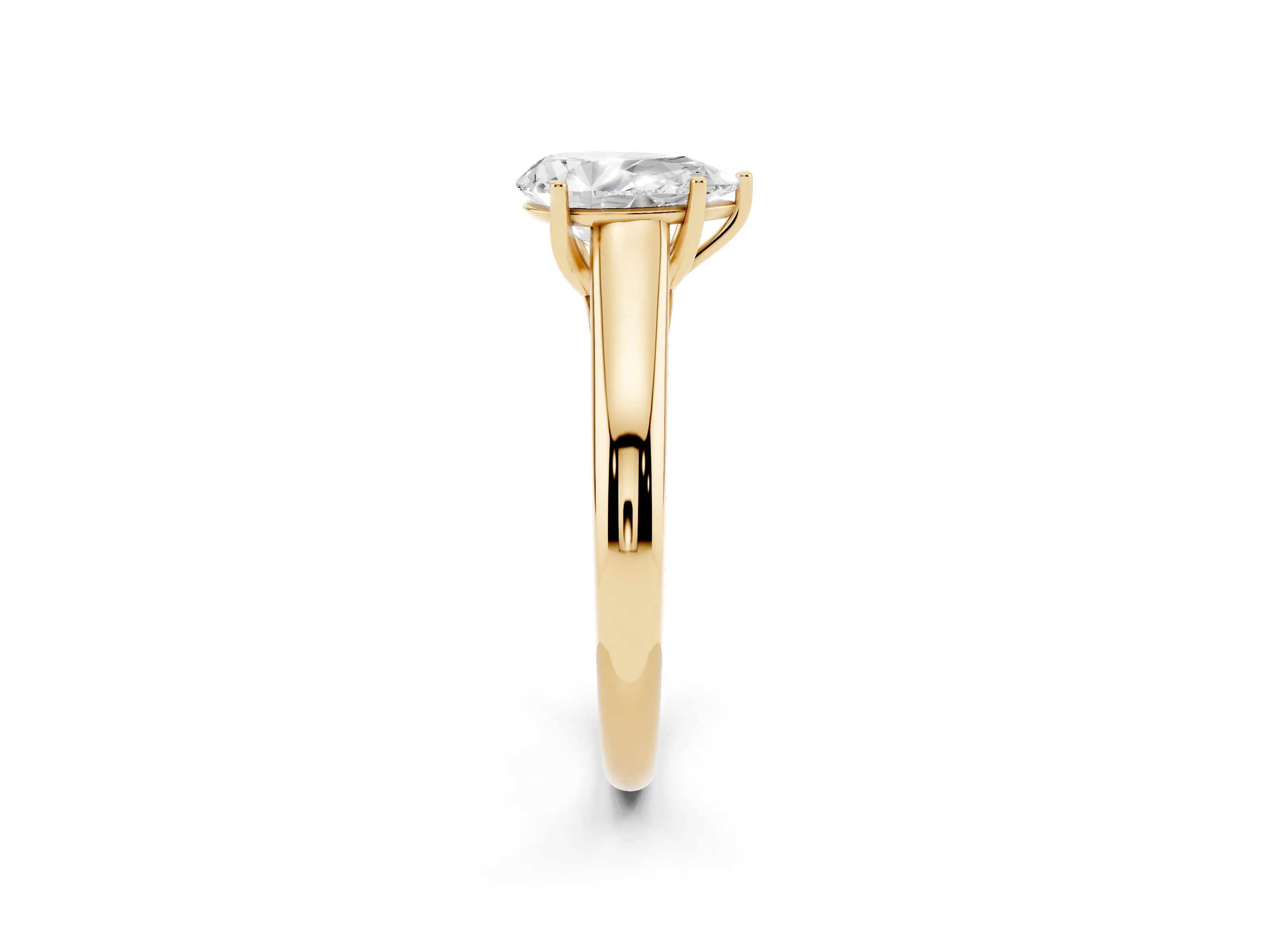 Pear Cut Diamond Solitaire Engagement Ring Set in Yellow gold with Subtly Tapered Band and Prong Setting
