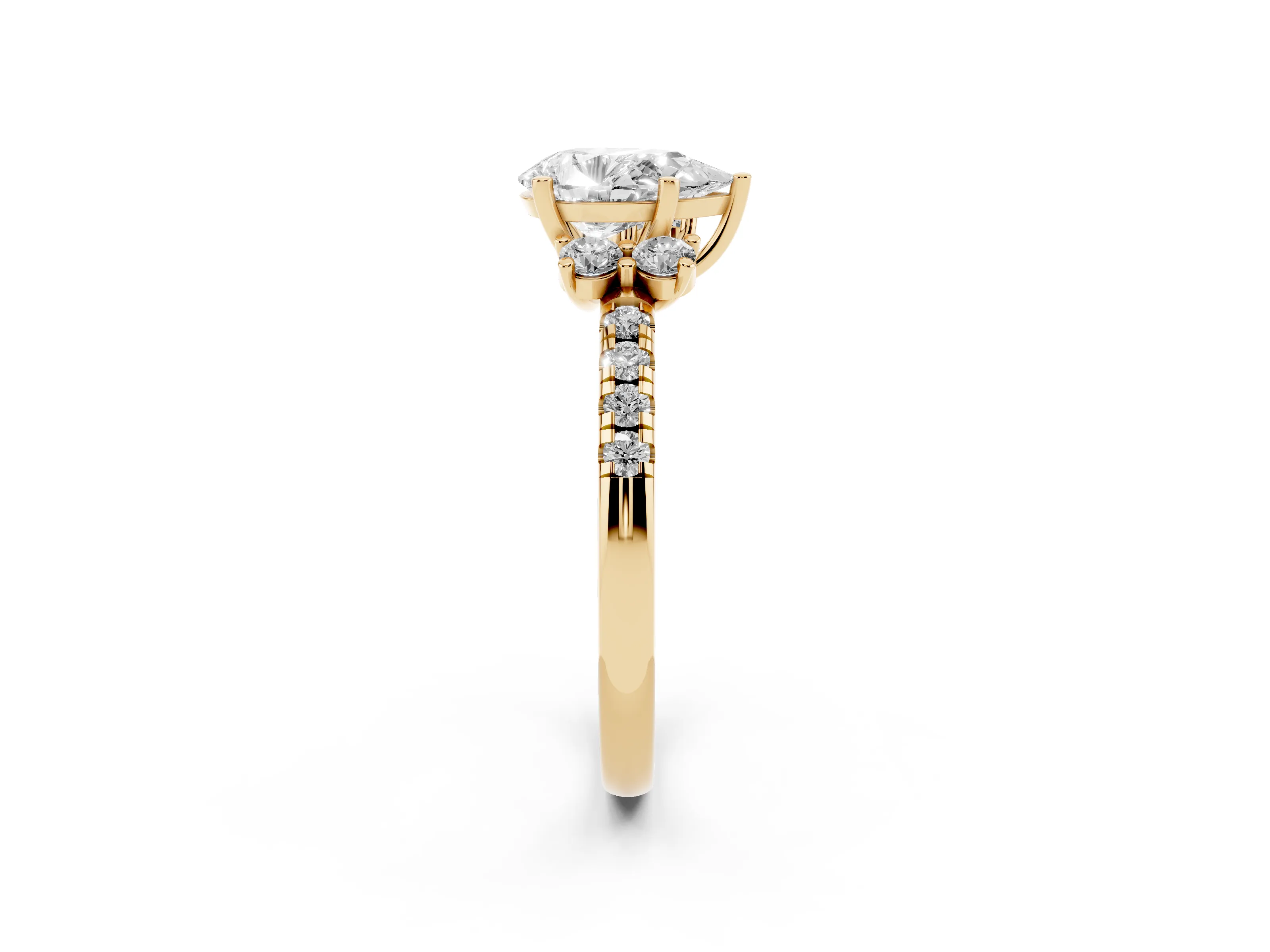 Pear Cut Diamond Three-Stone Pavé Ring Set in Yellow gold with Prong Setting