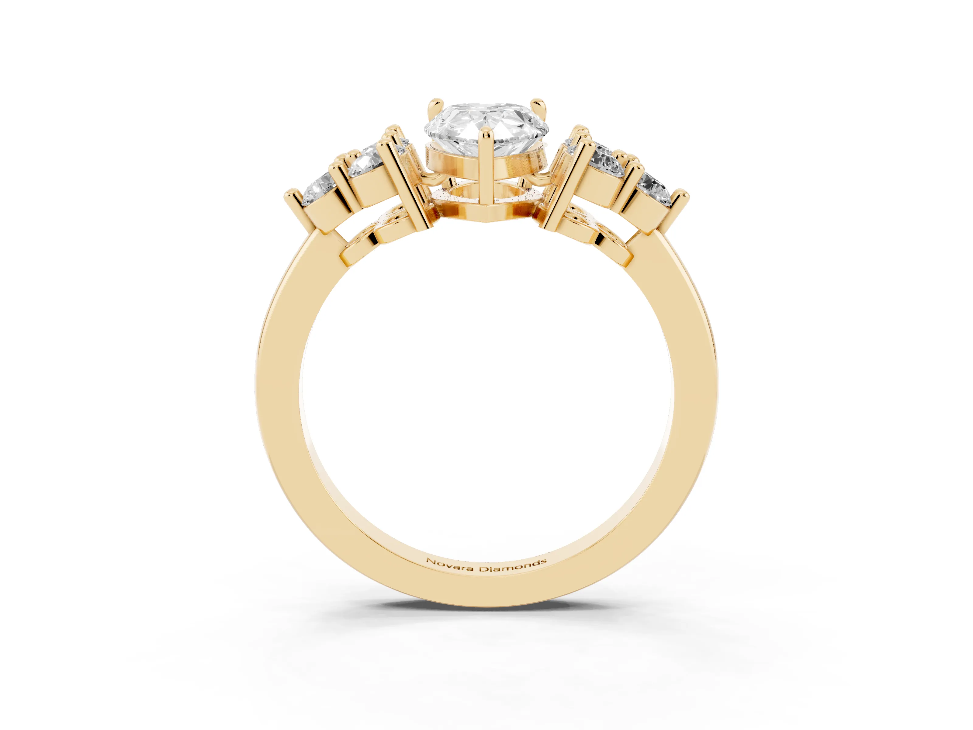 Pear Cut Diamond Solitaire Ring Set in Yellow gold with Cluster Accents on Each Side