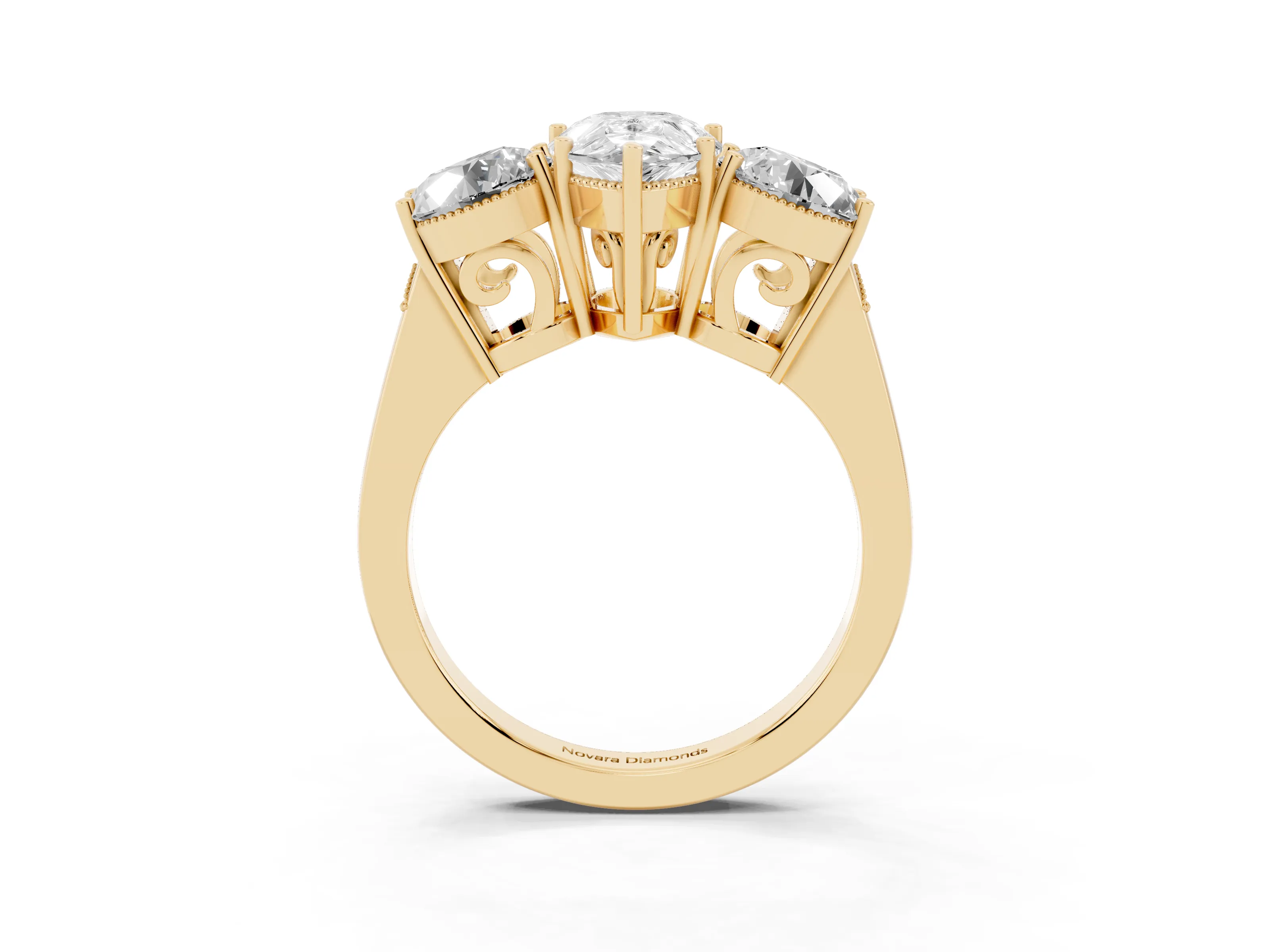 Pear Cut Diamond Three-Stone Engagement Ring Set in Yellow gold with Polished Band
