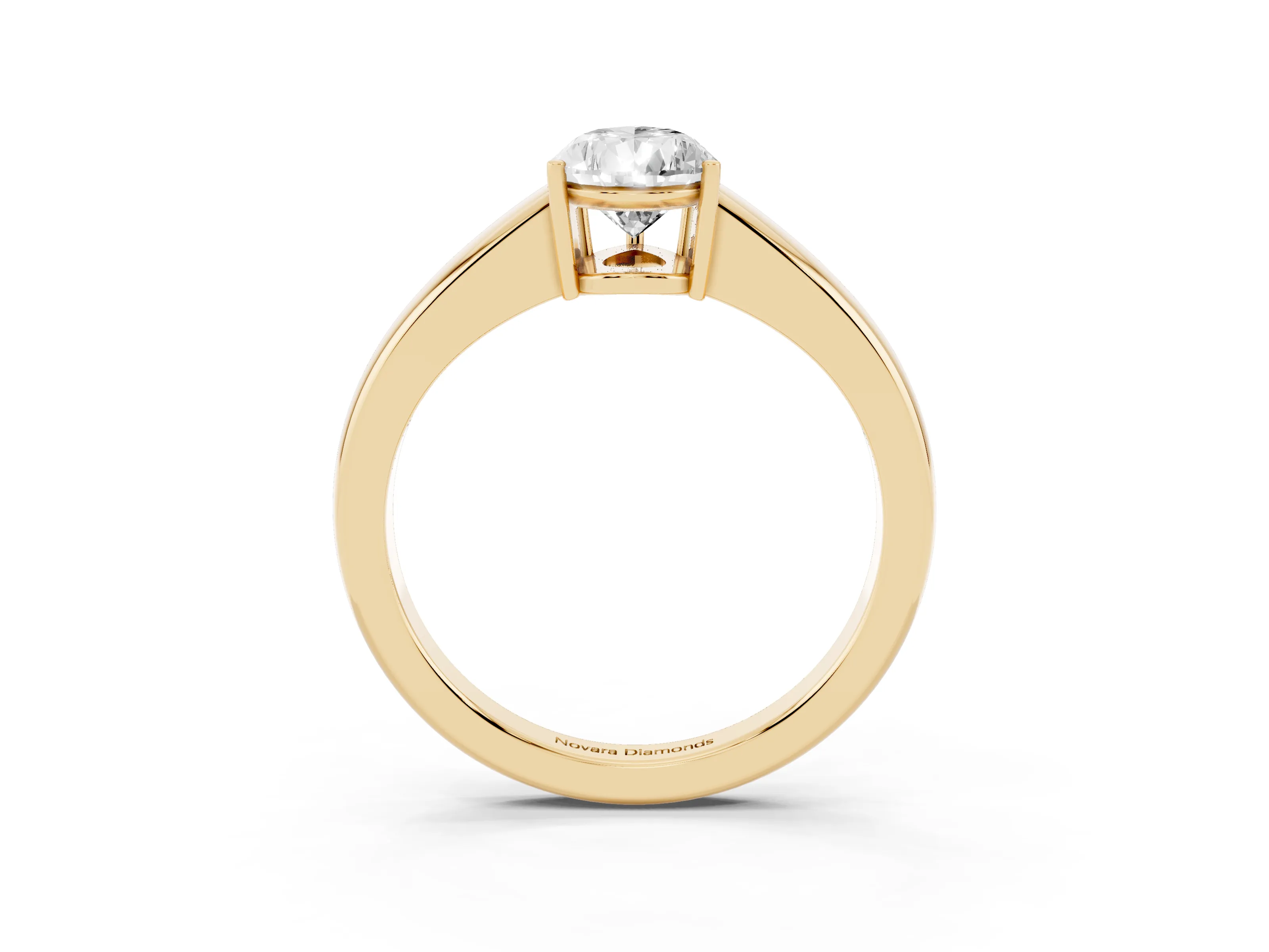 Pear Cut Diamond Solitaire Ring Set in Yellow gold with Tapered Band and Prong Setting