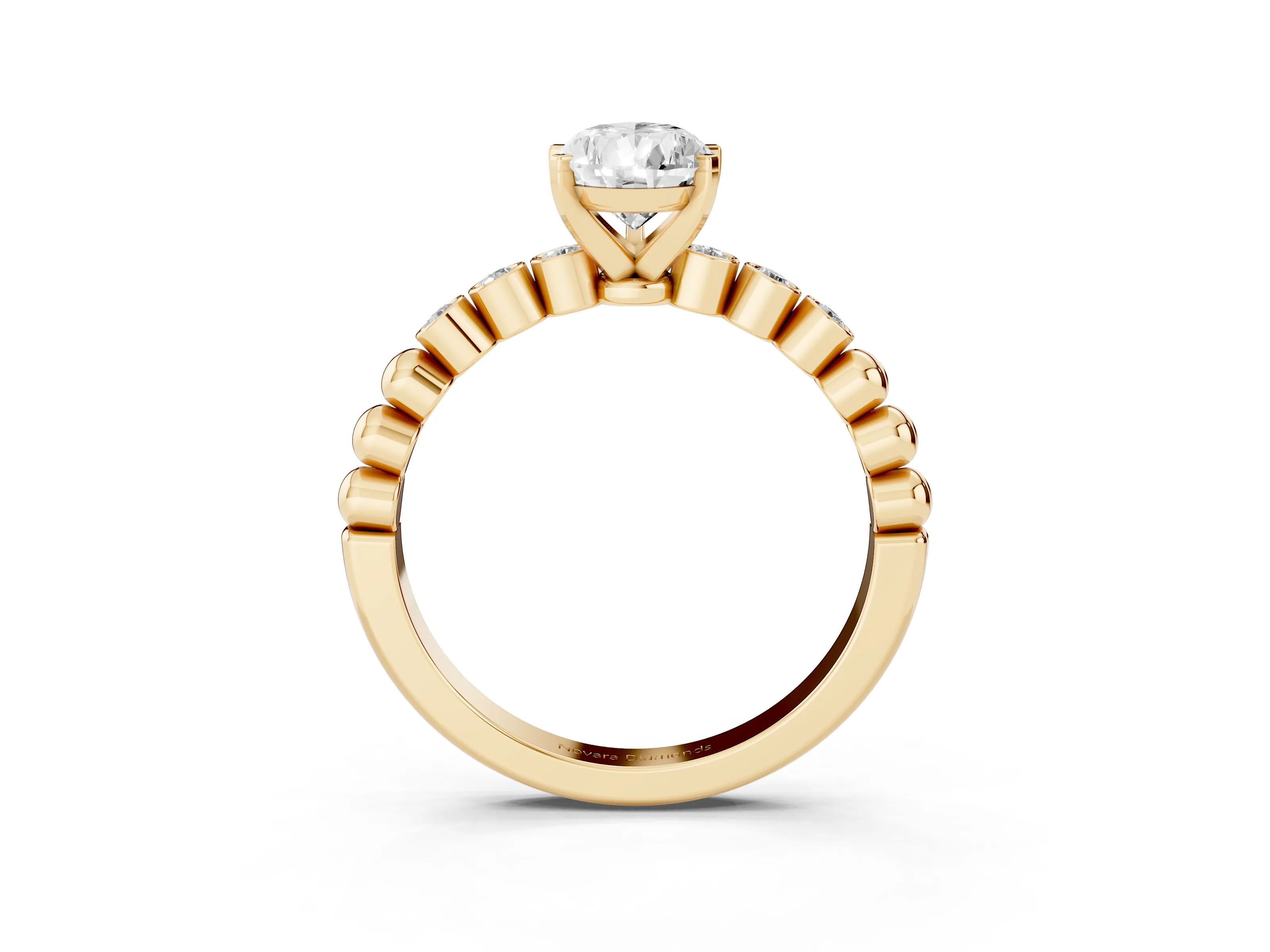 Pear Cut Diamond Solitaire Engagement Ring Set in Yellow gold with Bezel Accents on Beaded Band