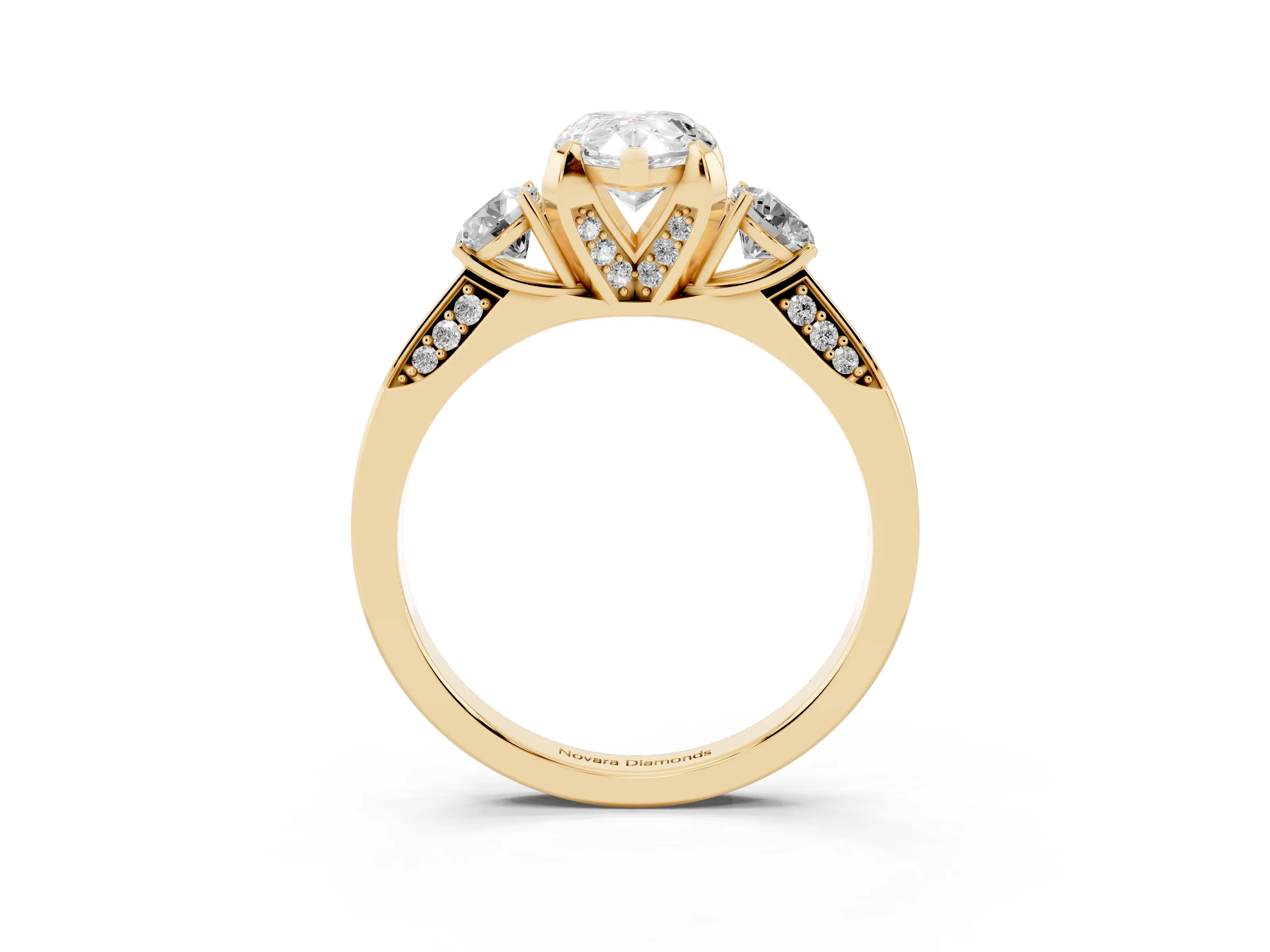 Pear Cut Diamond Three-Stone Ring Set in Yellow gold with Pavé Band and Smaller Side Stones