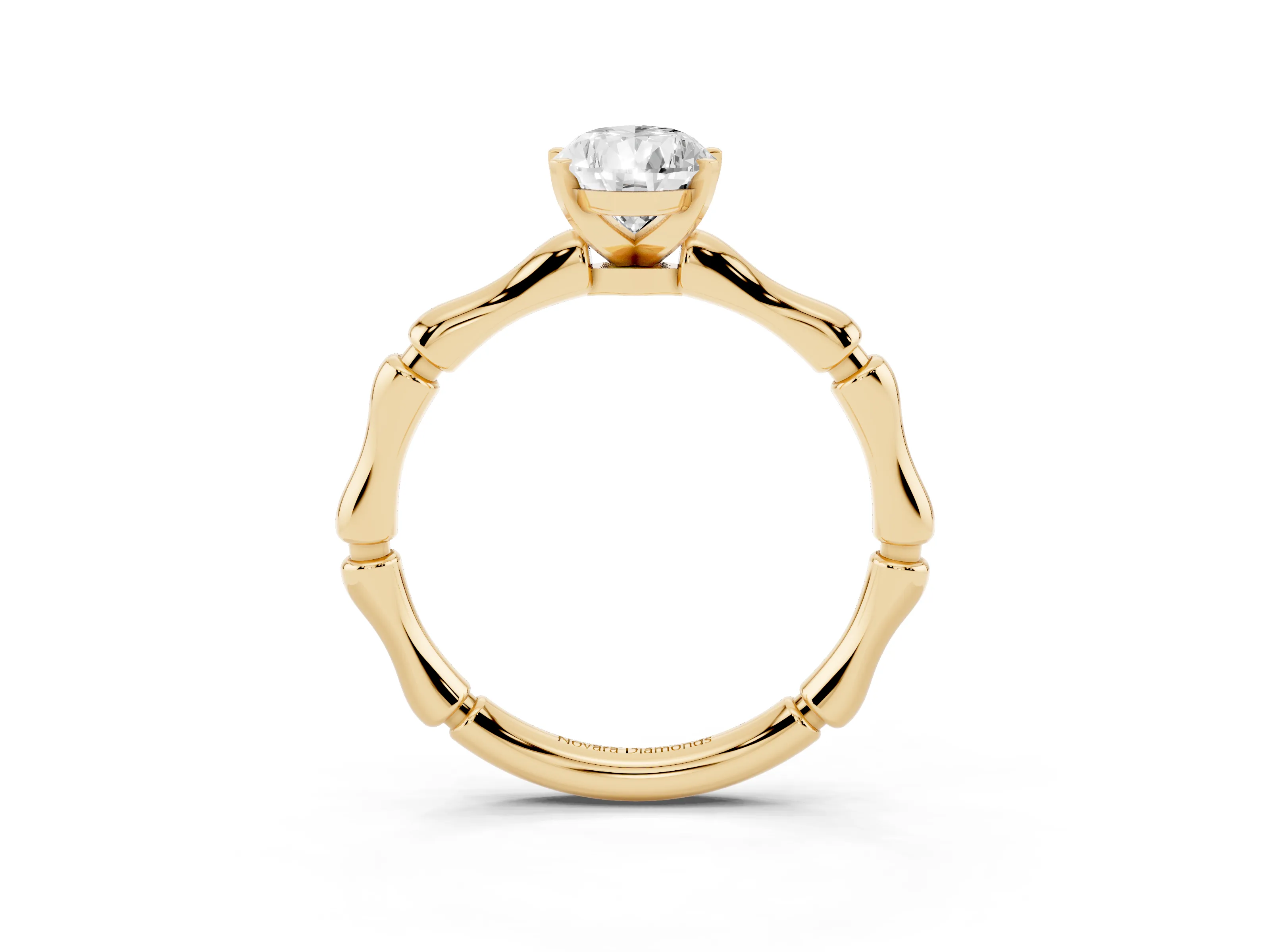 Pear Cut Diamond Solitaire Ring Set in Yellow gold with Bamboo Band and Prong Setting