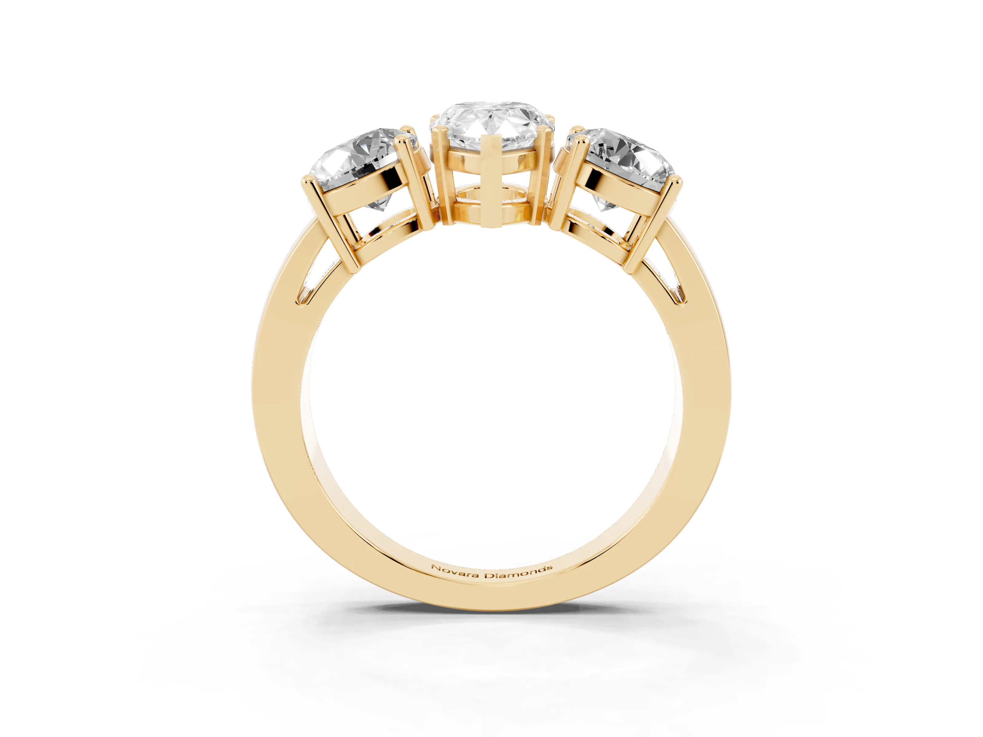 Pear Cut Diamond Three-Stone Ring Set in Yellow gold with Round Side Stones and Classic Band