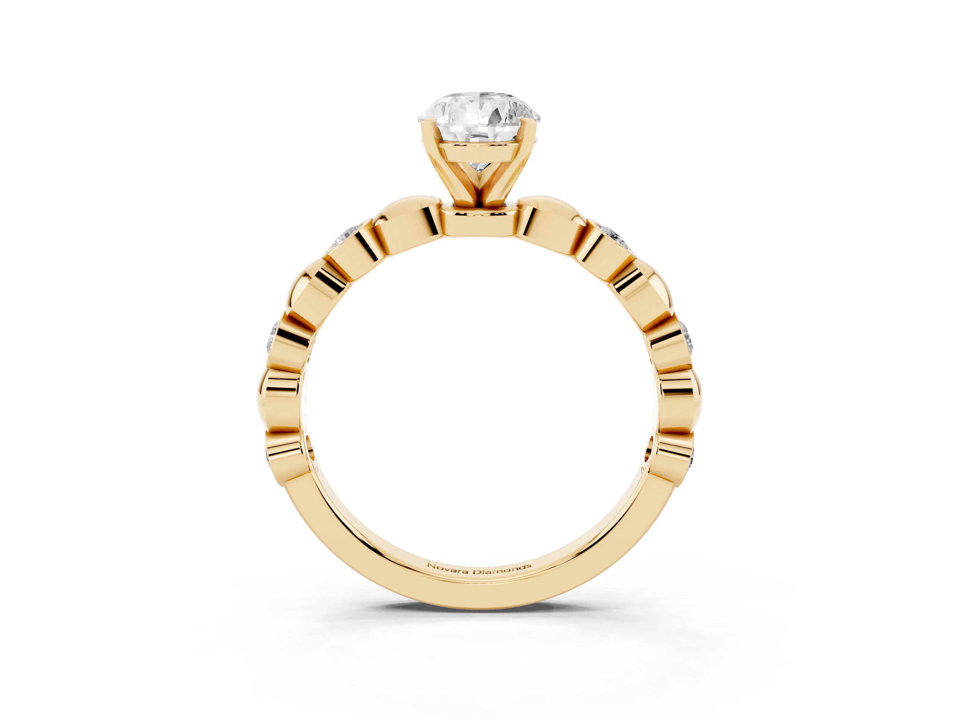 Pear Cut Diamond Solitaire Ring Set in Yellow gold with Bezel-Set Accents on Beaded Band and Prong Setting