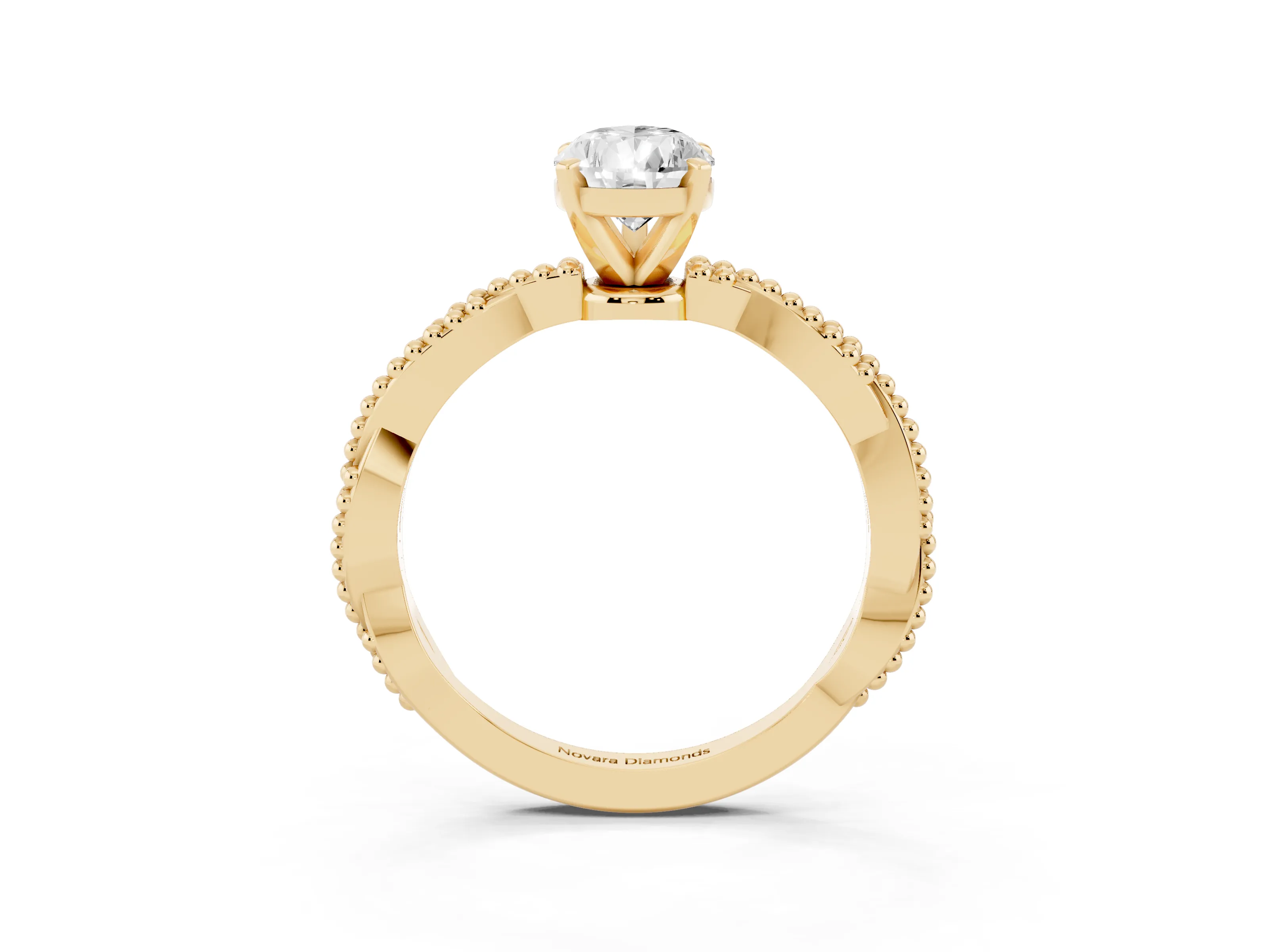 Pear Cut Diamond Solitaire Ring Set in Yellow gold with Twisted Band and Bead Prong Setting