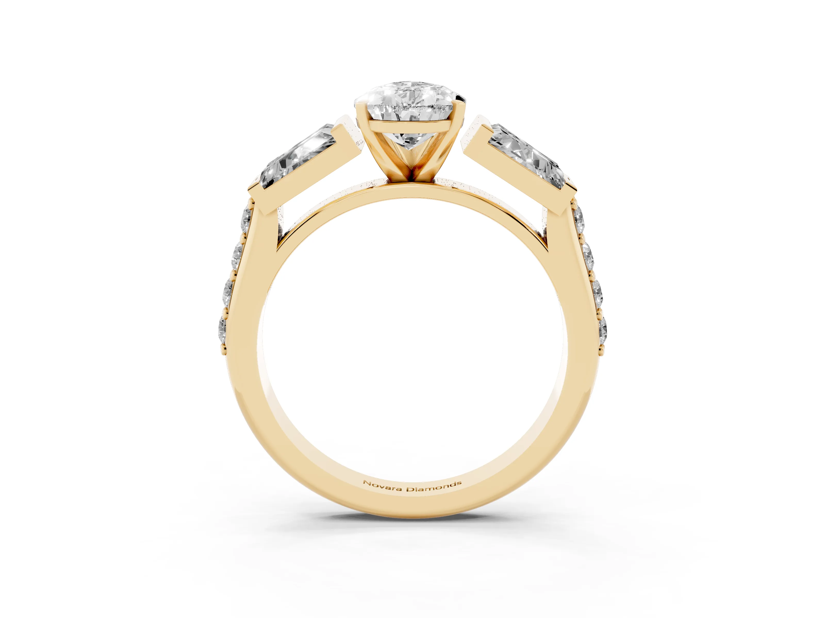 Pear Cut Diamond Engagement Ring Set in Yellow gold with Baguette Side Stones and Channel Set Band