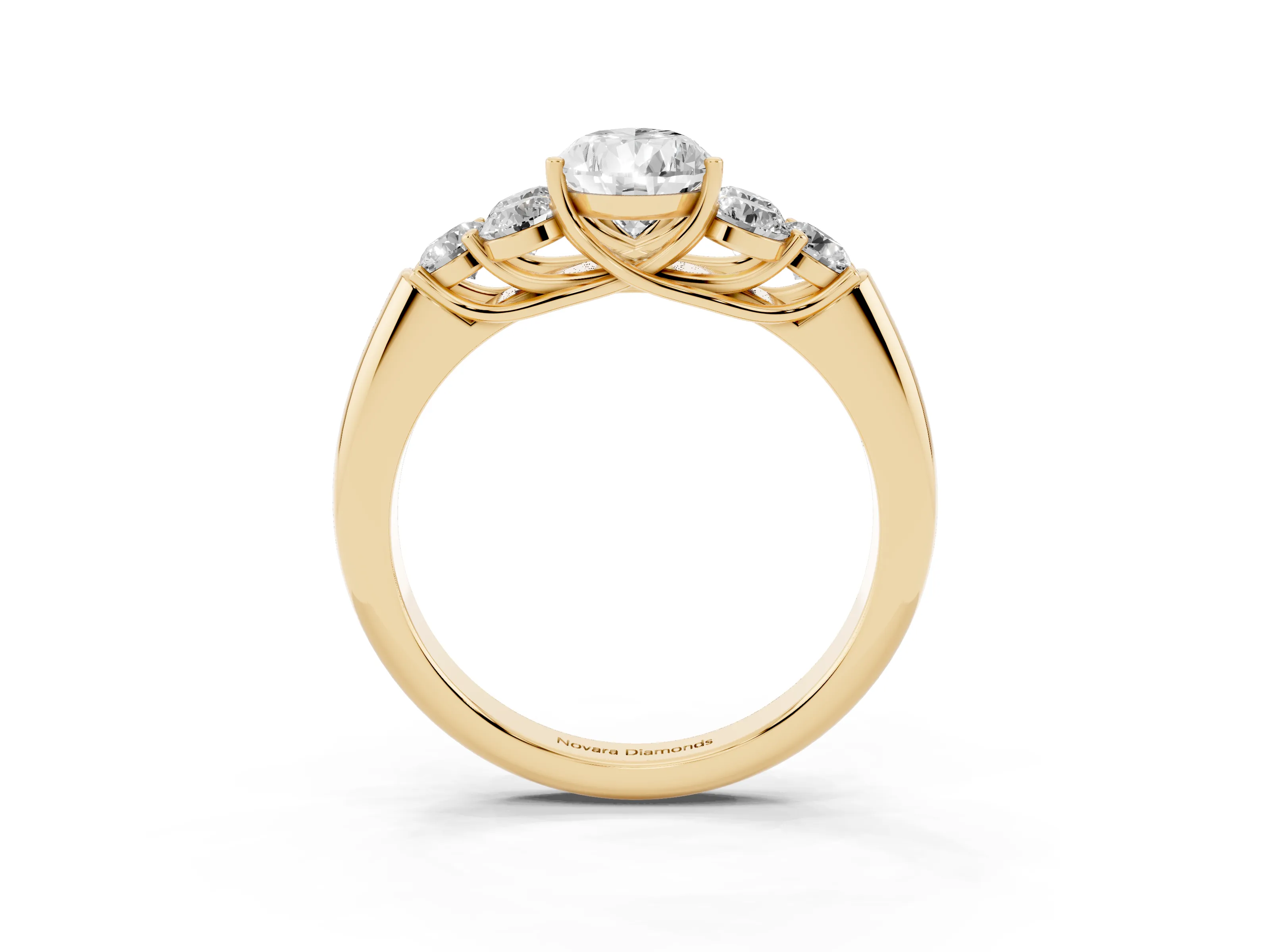 Pear Cut Diamond Cluster Ring Set in Yellow gold with Round Accent Stones and Prong Setting on a Plain Band