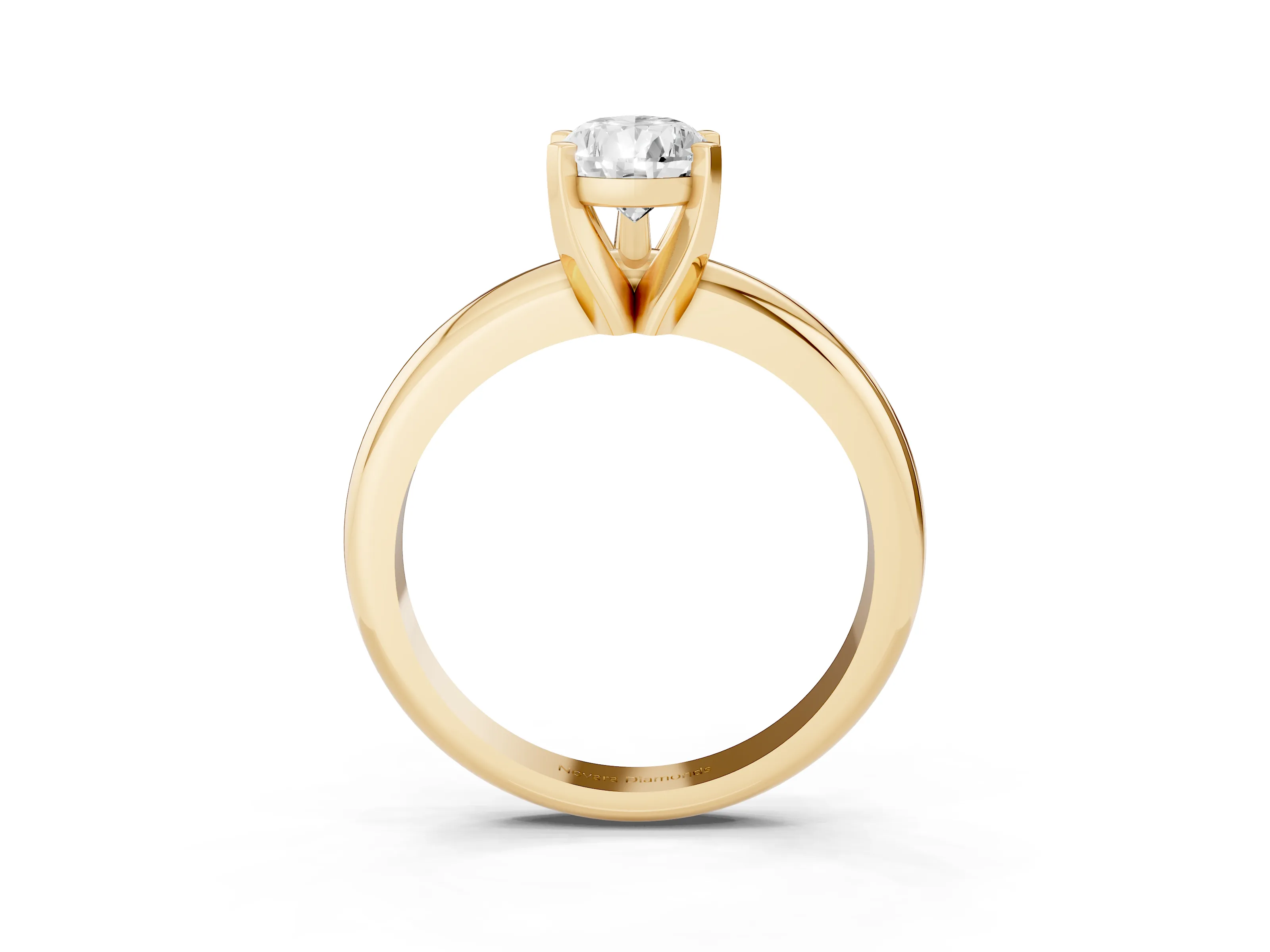 Pear Cut Diamond Solitaire Engagement Ring Set in Yellow gold with Round Band and Prong Setting