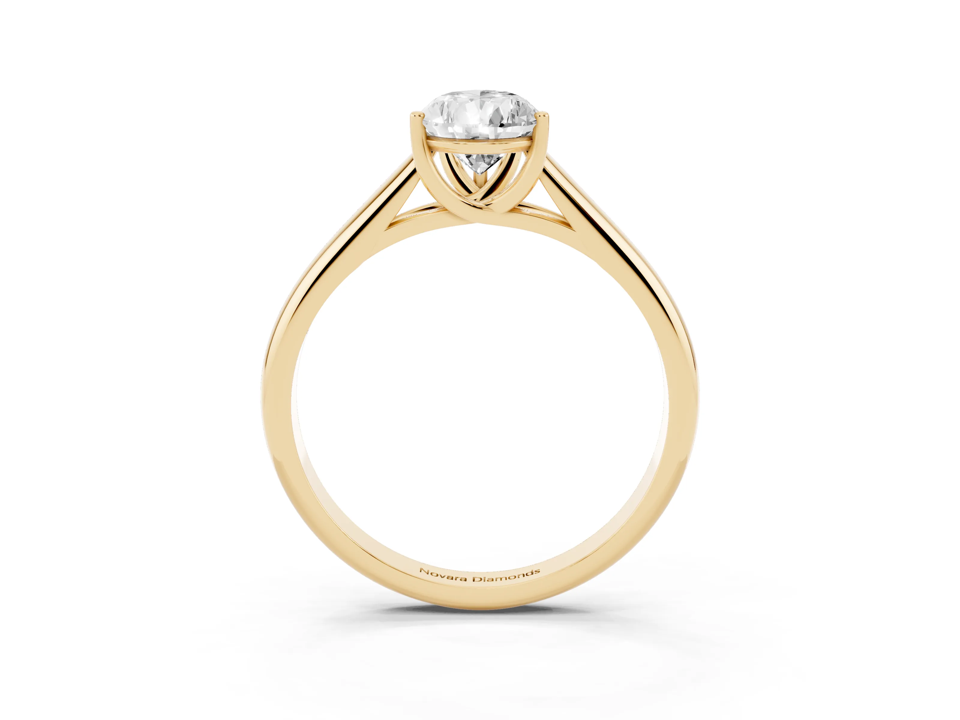 Pear Cut Diamond Solitaire Engagement Ring Set in Yellow gold with Subtly Tapered Band and Prong Setting