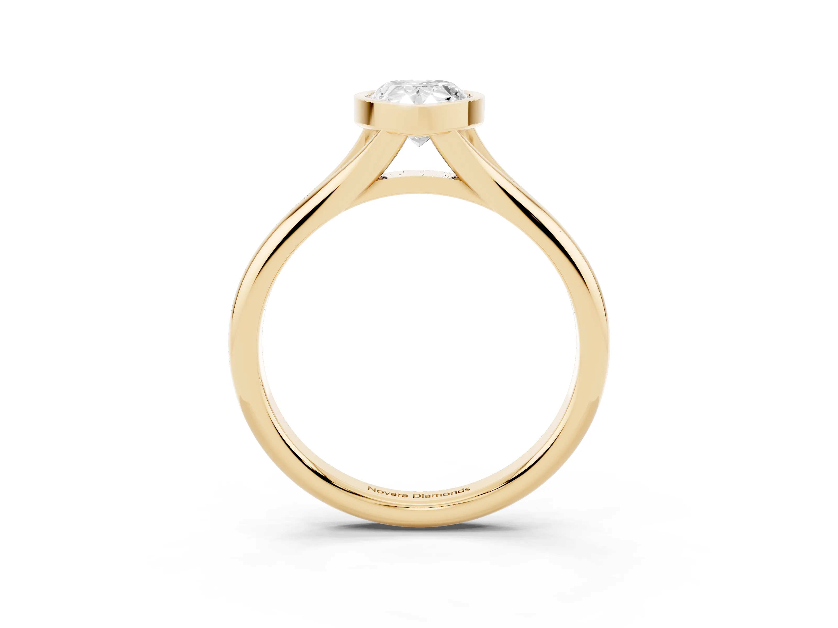 Bezel Set Pear Cut Diamond Solitaire Ring Set in Yellow gold with Smooth Band