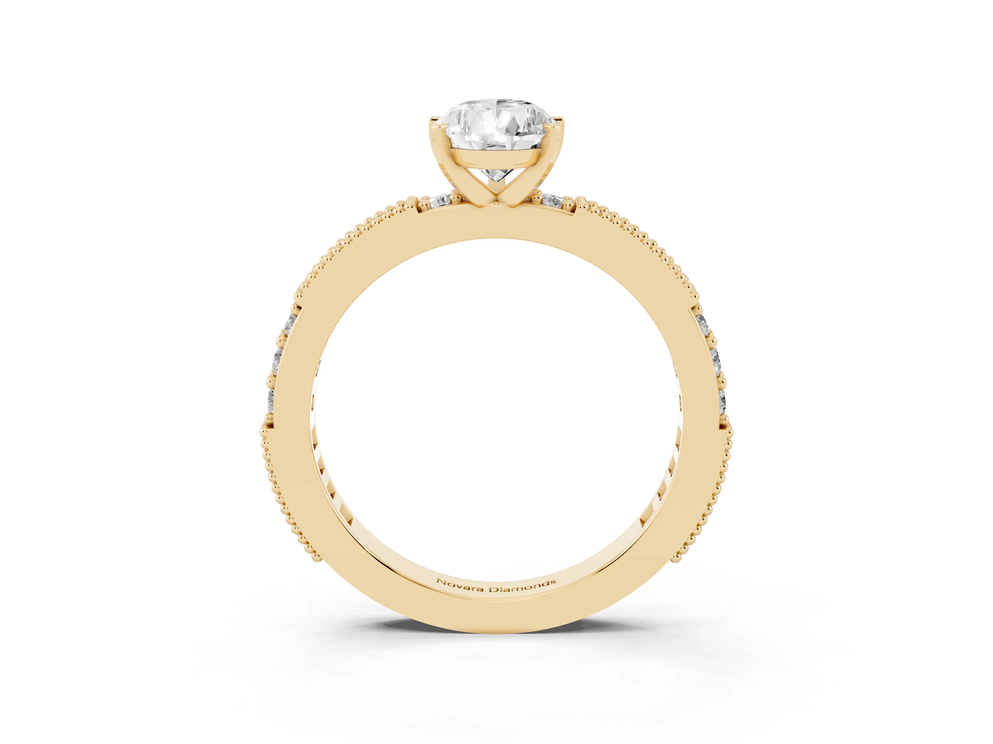 Pear Cut Diamond Solitaire Ring Set in Yellow gold with Slim Pavé Band and Prong Setting