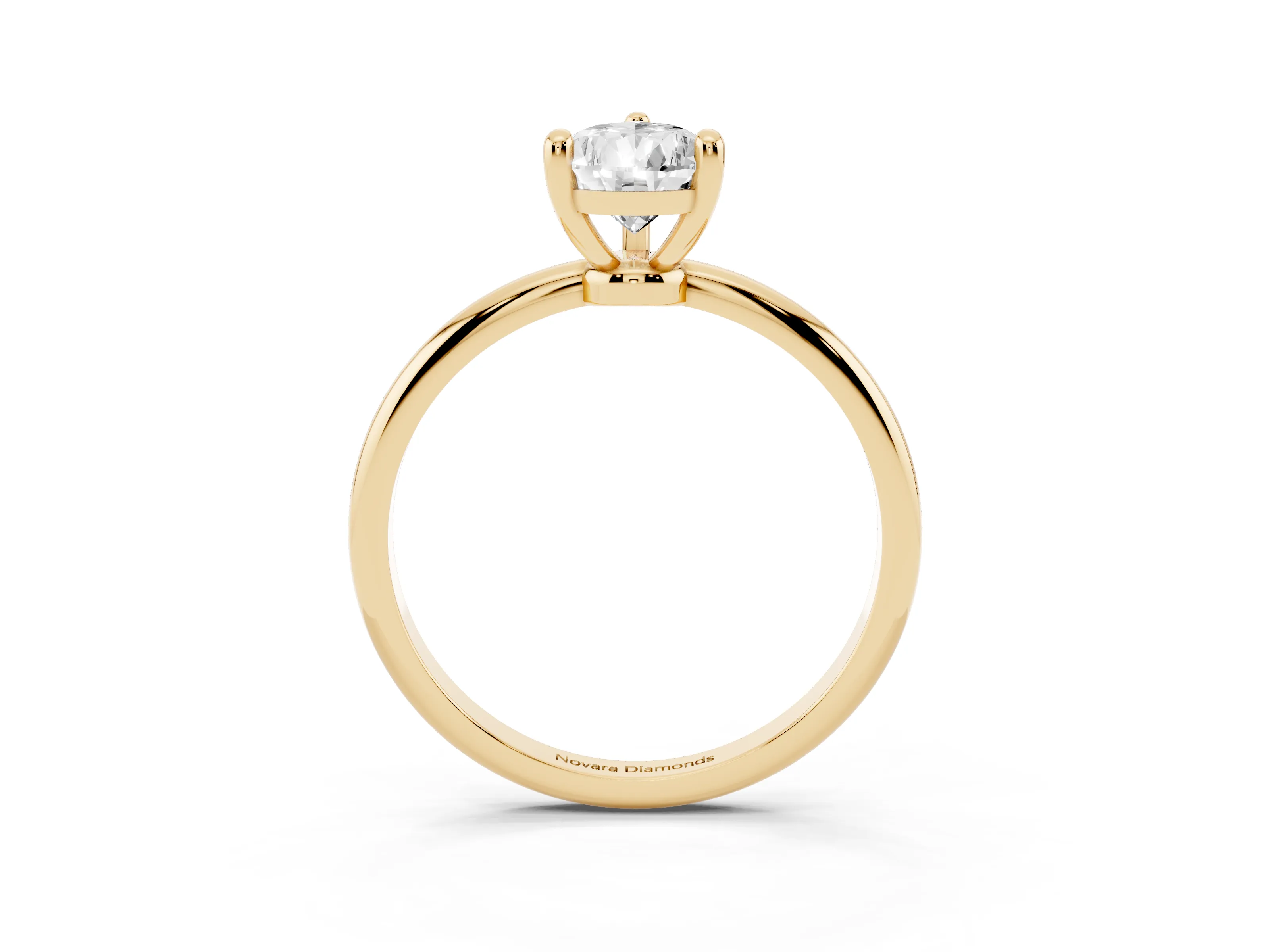 Pear Cut Diamond Solitaire Ring Set in Yellow gold with Secure Prong Setting on a Classic Band