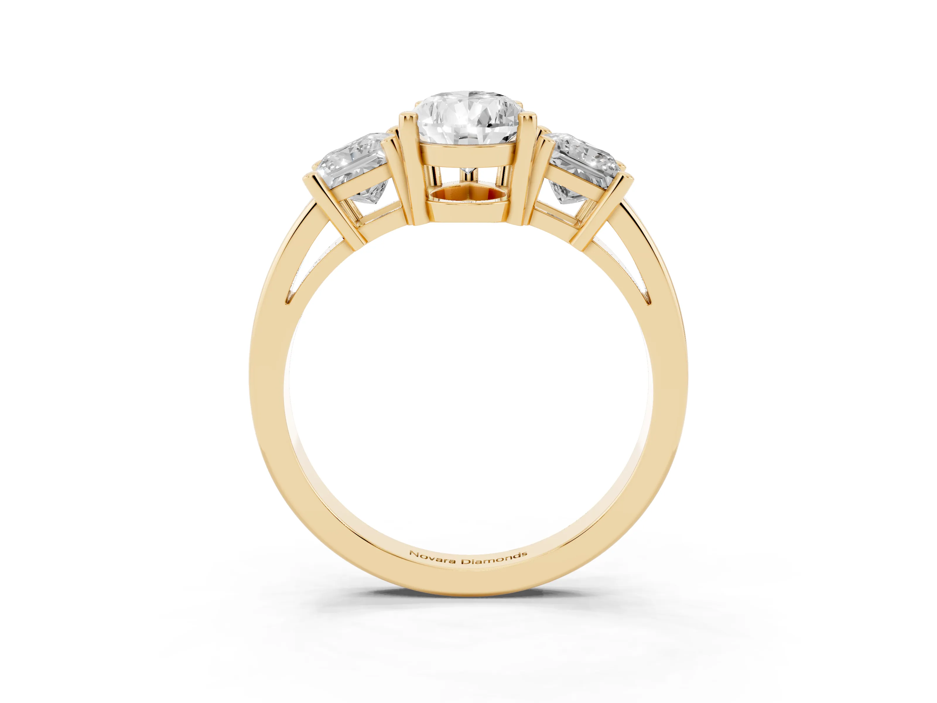 Three-Stone Pear Cut Diamond Solitaire Ring Set in Yellow gold with Prong Setting
