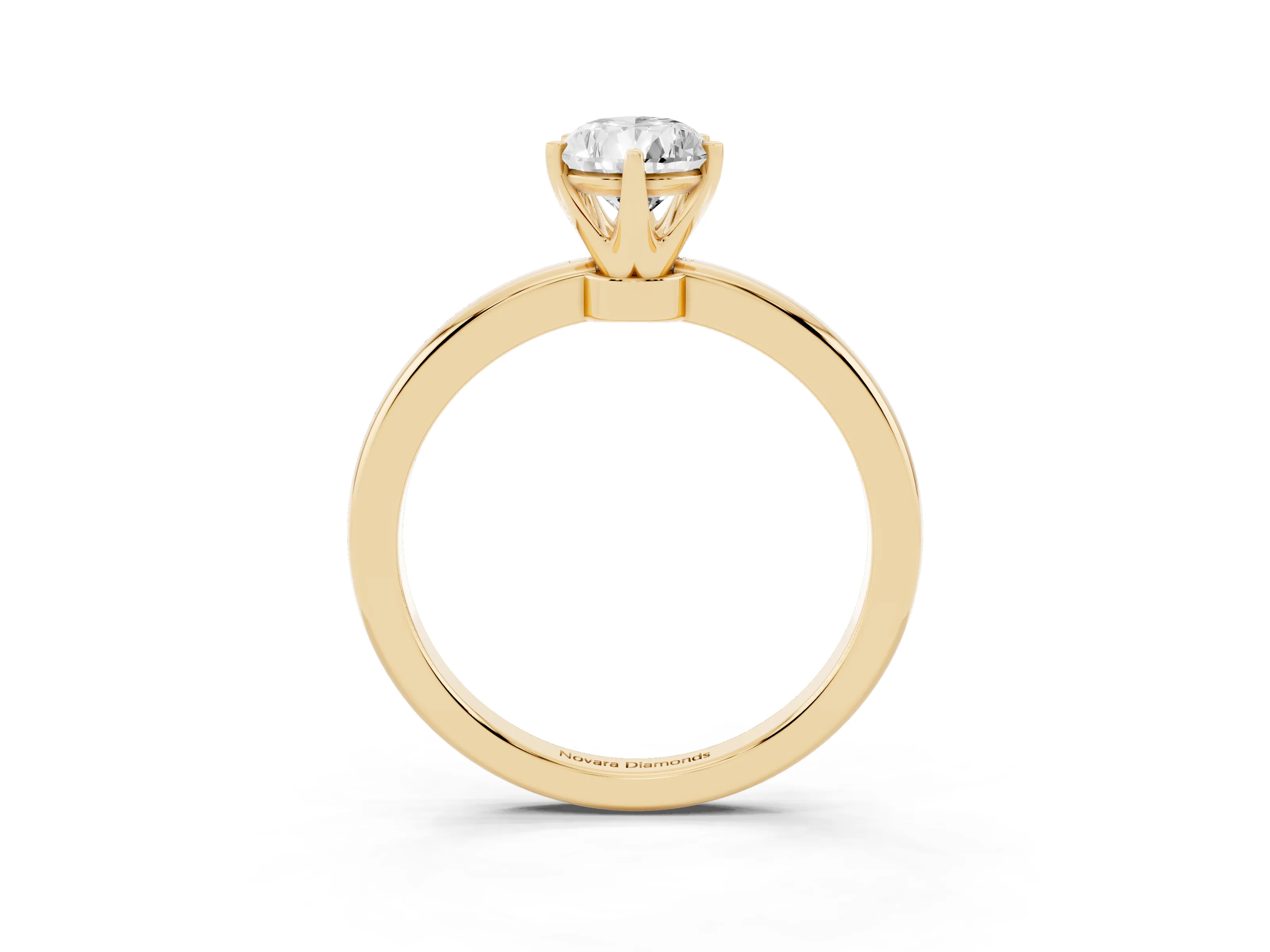 Pear Cut Diamond Solitaire Ring Set in Yellow gold with Raised Prong Setting on a Classic Band