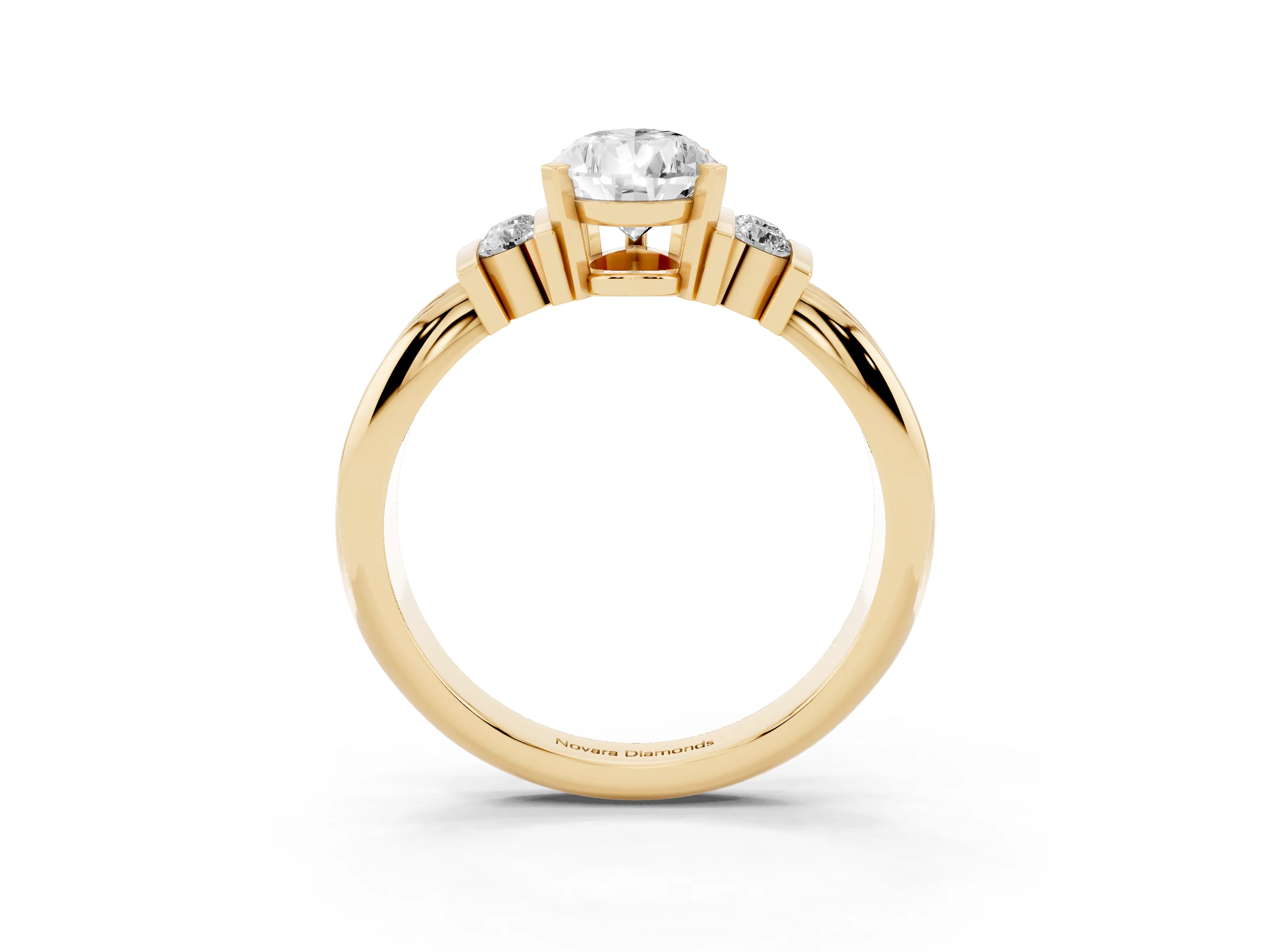 Three-Stone Pear Cut Diamond Channel Set Ring Set in Yellow gold with Bar Prongs