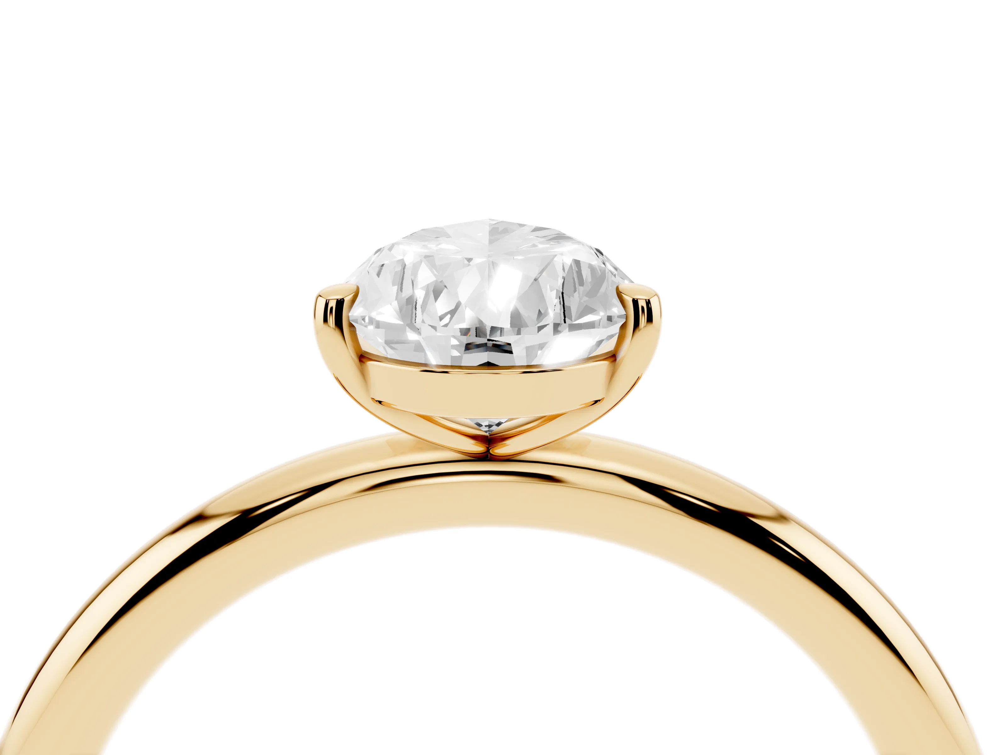 Pear Cut Diamond Solitaire Ring Set in Yellow gold with Prong Setting on a Polished Plain Band