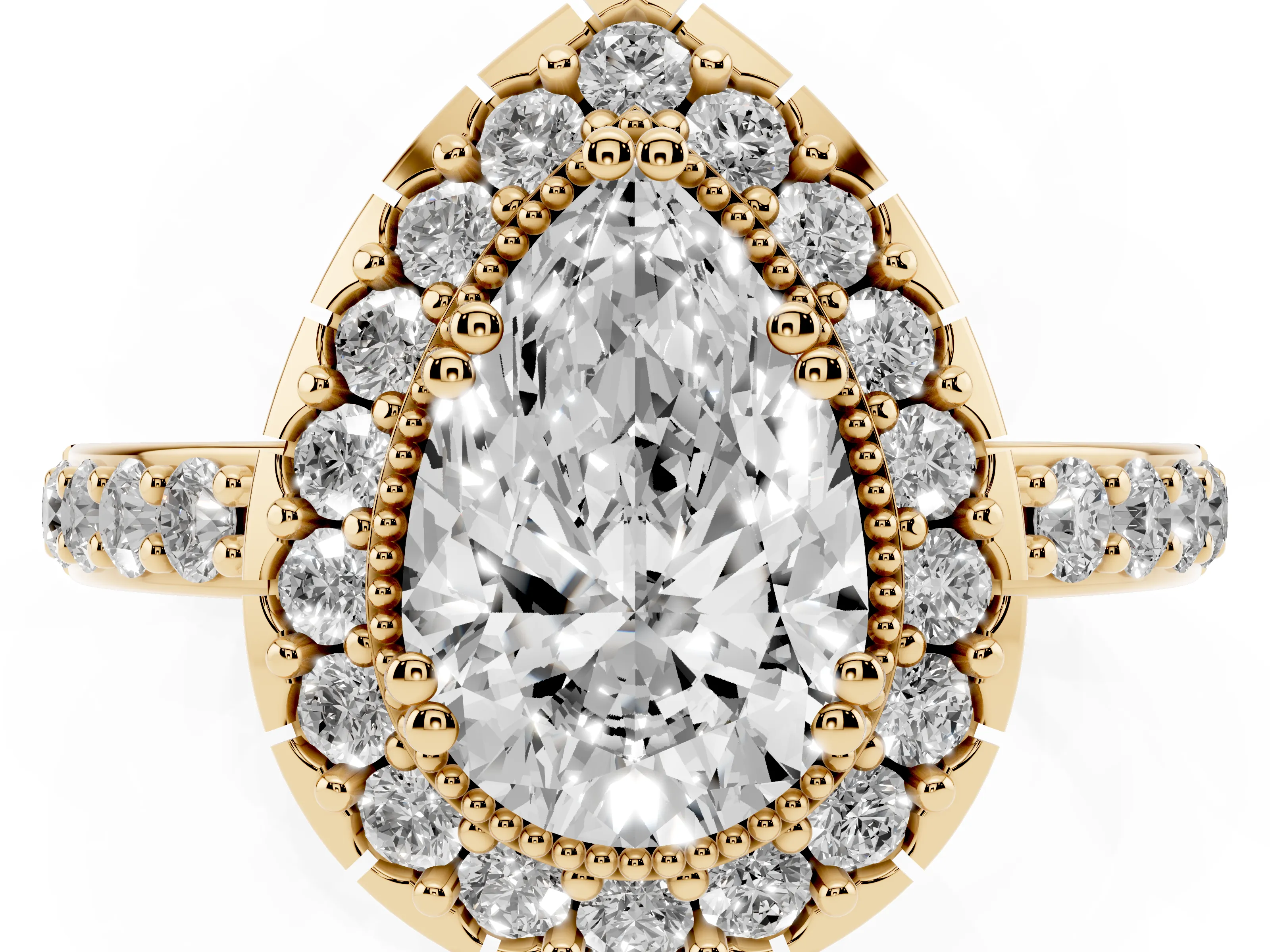 Pear Cut Diamond Halo Ring Set in Yellow gold with Pavé Shank and Prong Setting
