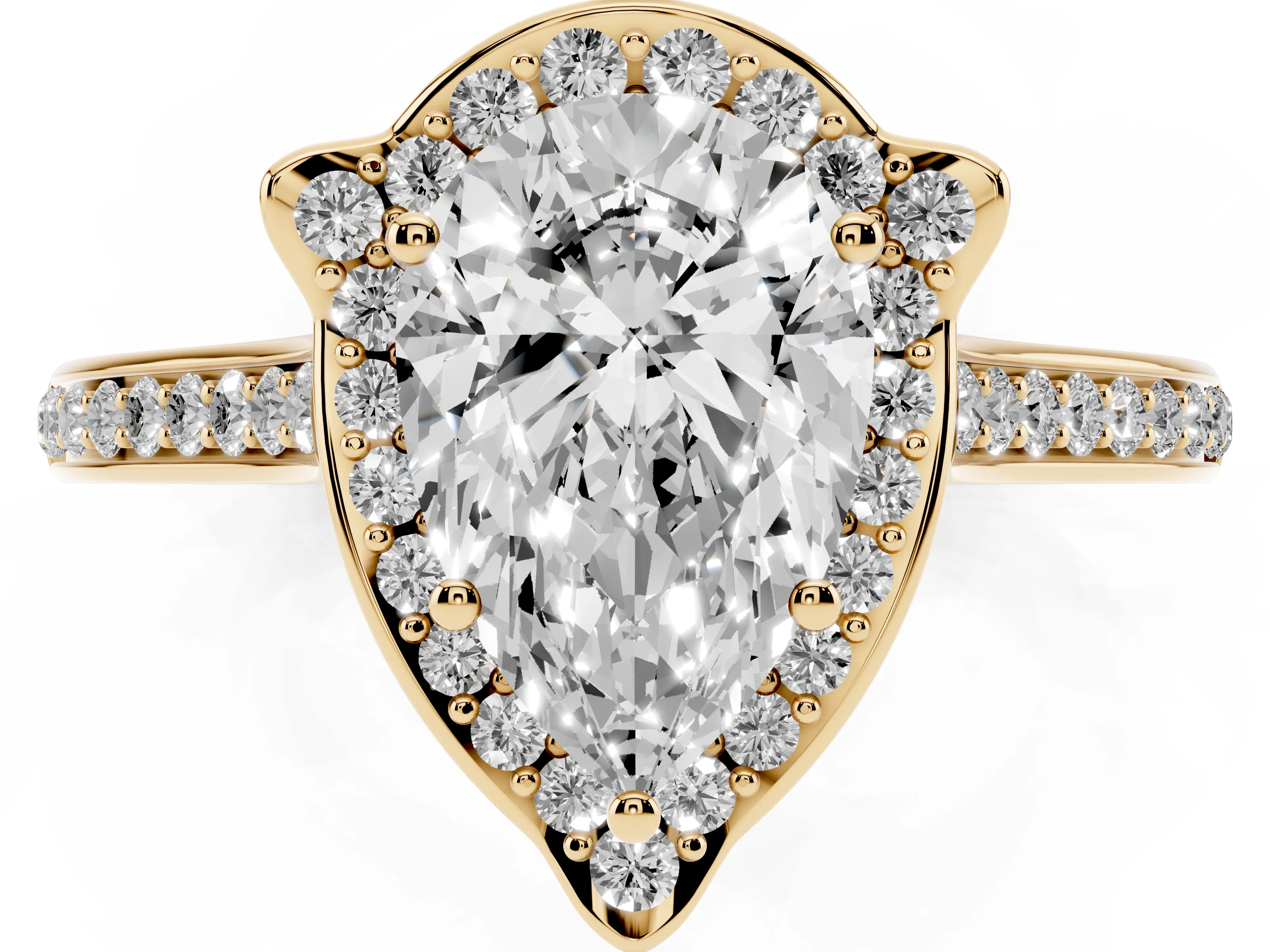 Pear Cut Diamond Halo Ring Set in Yellow gold with Pavé-Lined Shoulders and Prong Setting