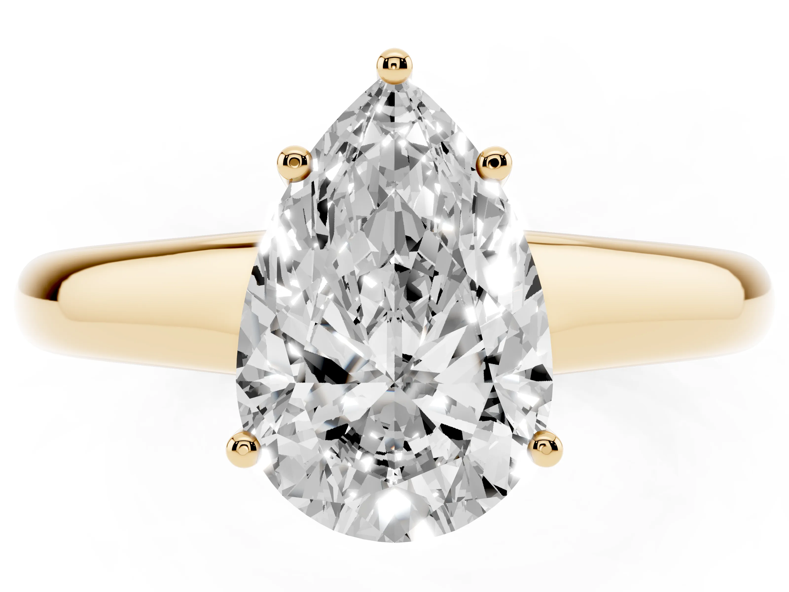 Pear Cut Diamond Solitaire Engagement Ring Set in Yellow gold with Subtly Tapered Band and Prong Setting