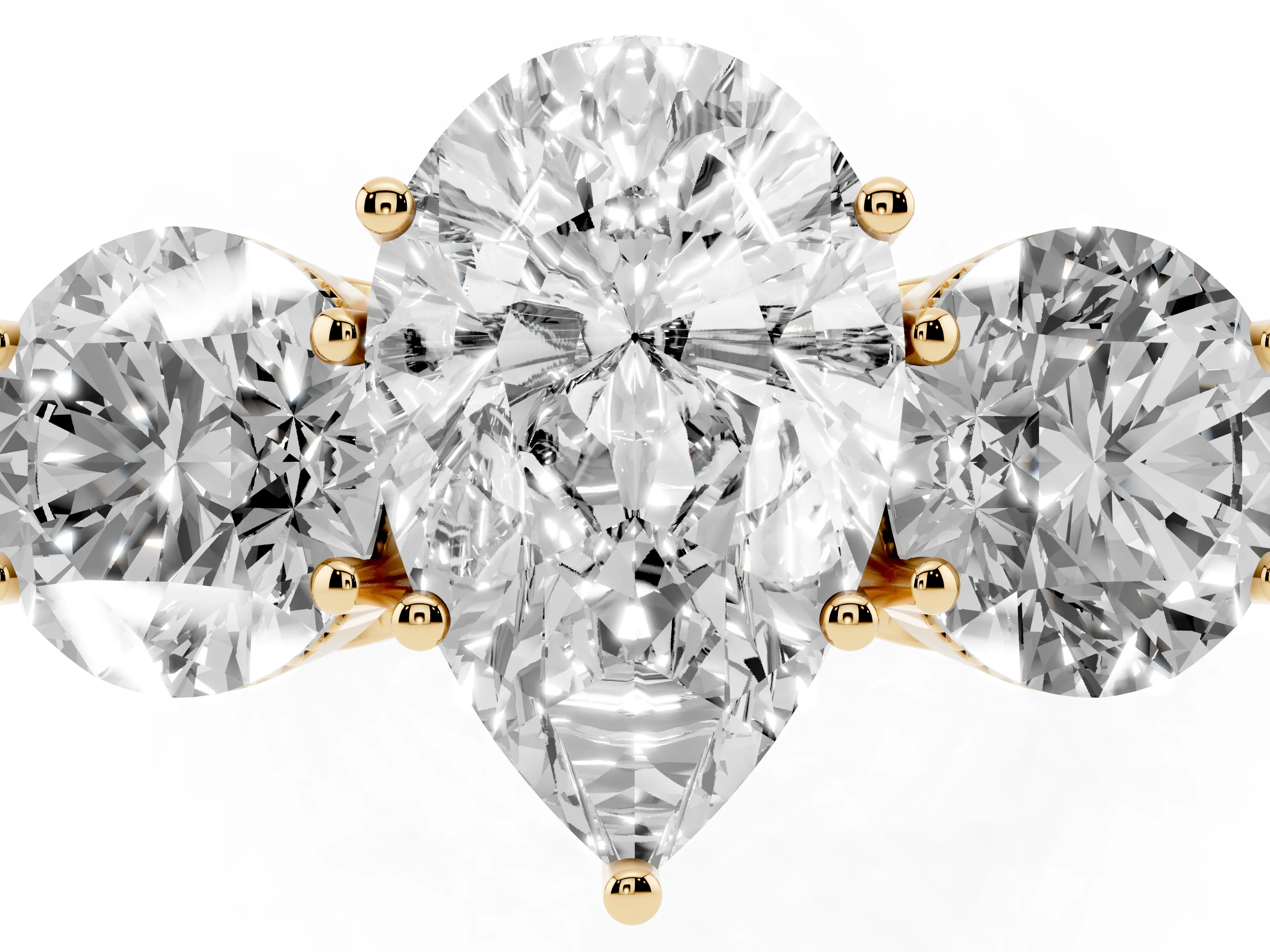 Pear Cut Diamond Three-Stone Engagement Ring Set in Yellow gold with Polished Band