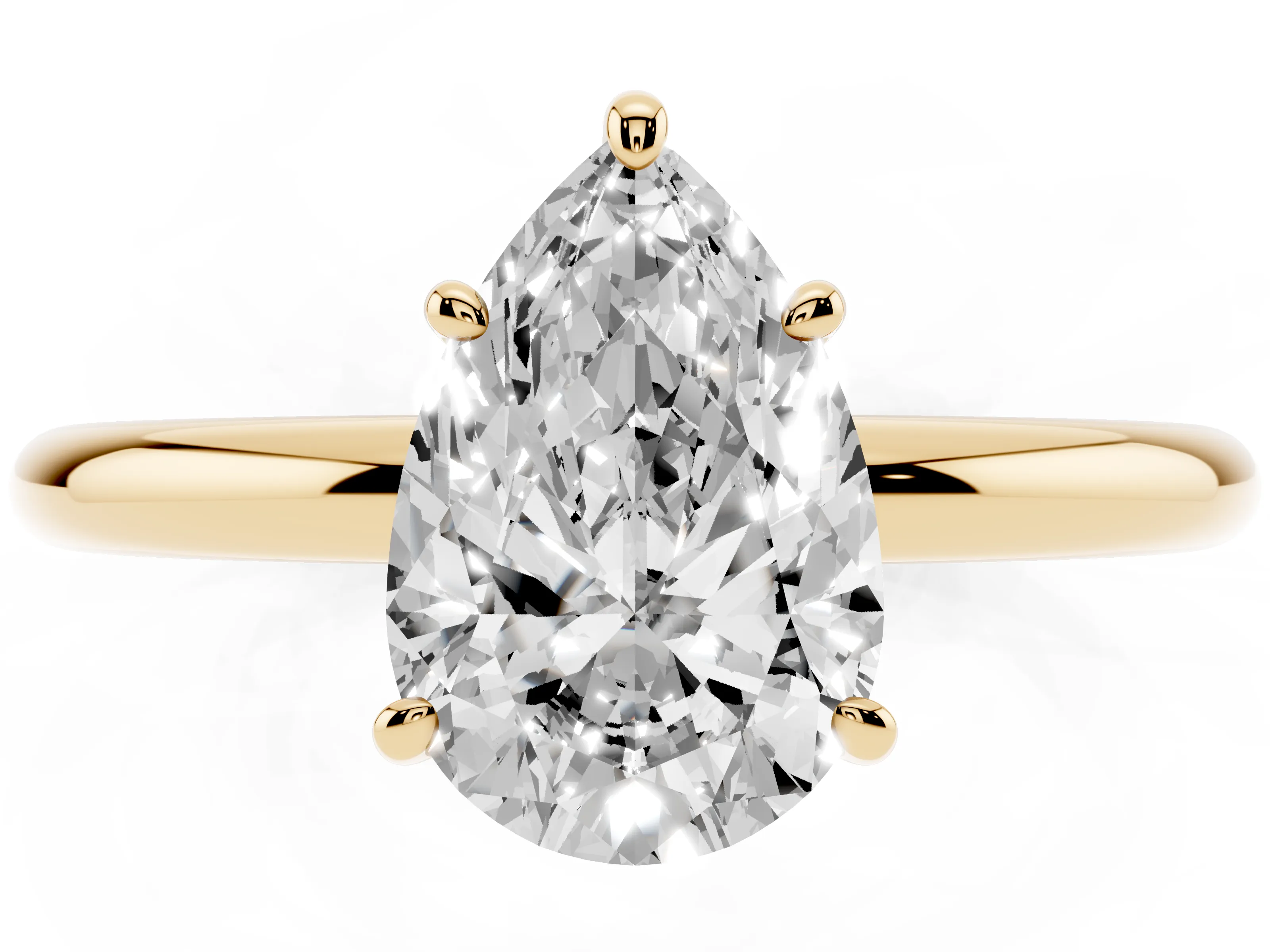 Pear Cut Diamond Solitaire Ring Set in Yellow gold with Prong Setting on a Polished Plain Band