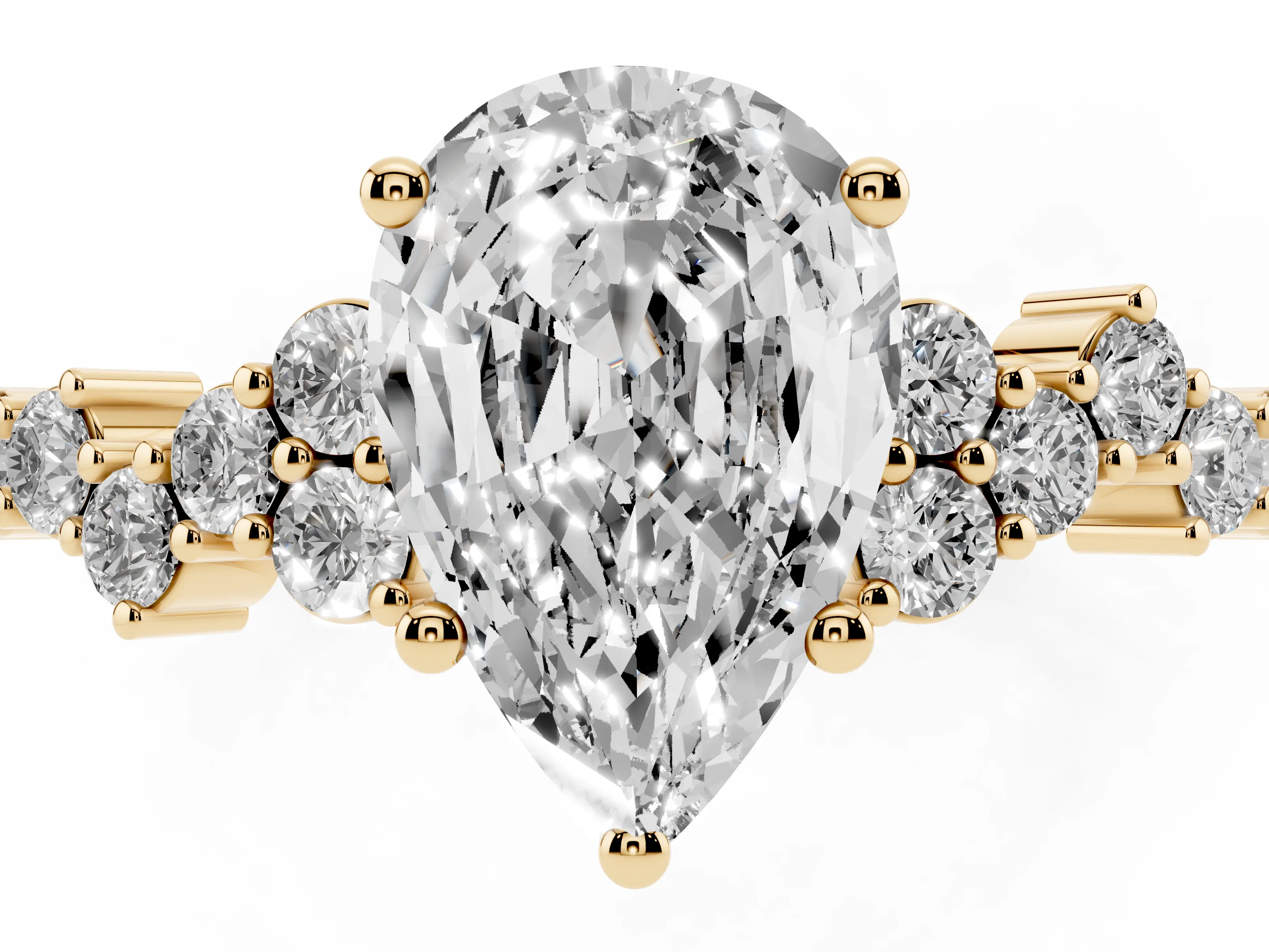 Pear Cut Diamond Ring Set in Yellow gold with Scattered Round Accents