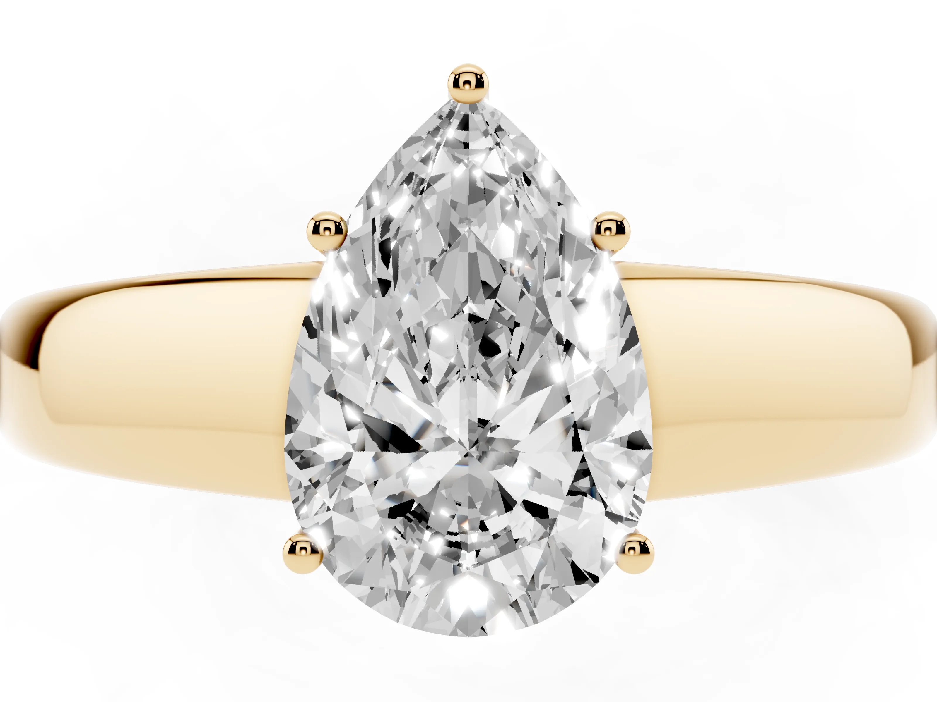 Pear Cut Diamond Solitaire Ring Set in Yellow gold with Tapered Band and Prong Setting