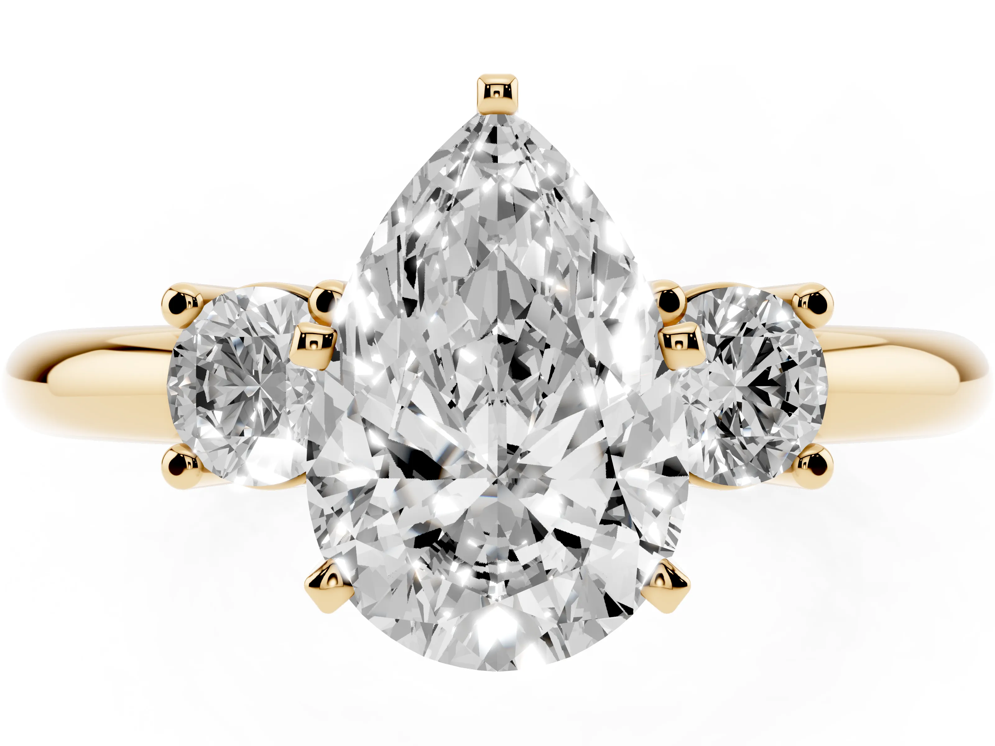 Three-Stone Pear Cut Diamond Ring Set in Yellow gold with Prong Setting and Plain Band
