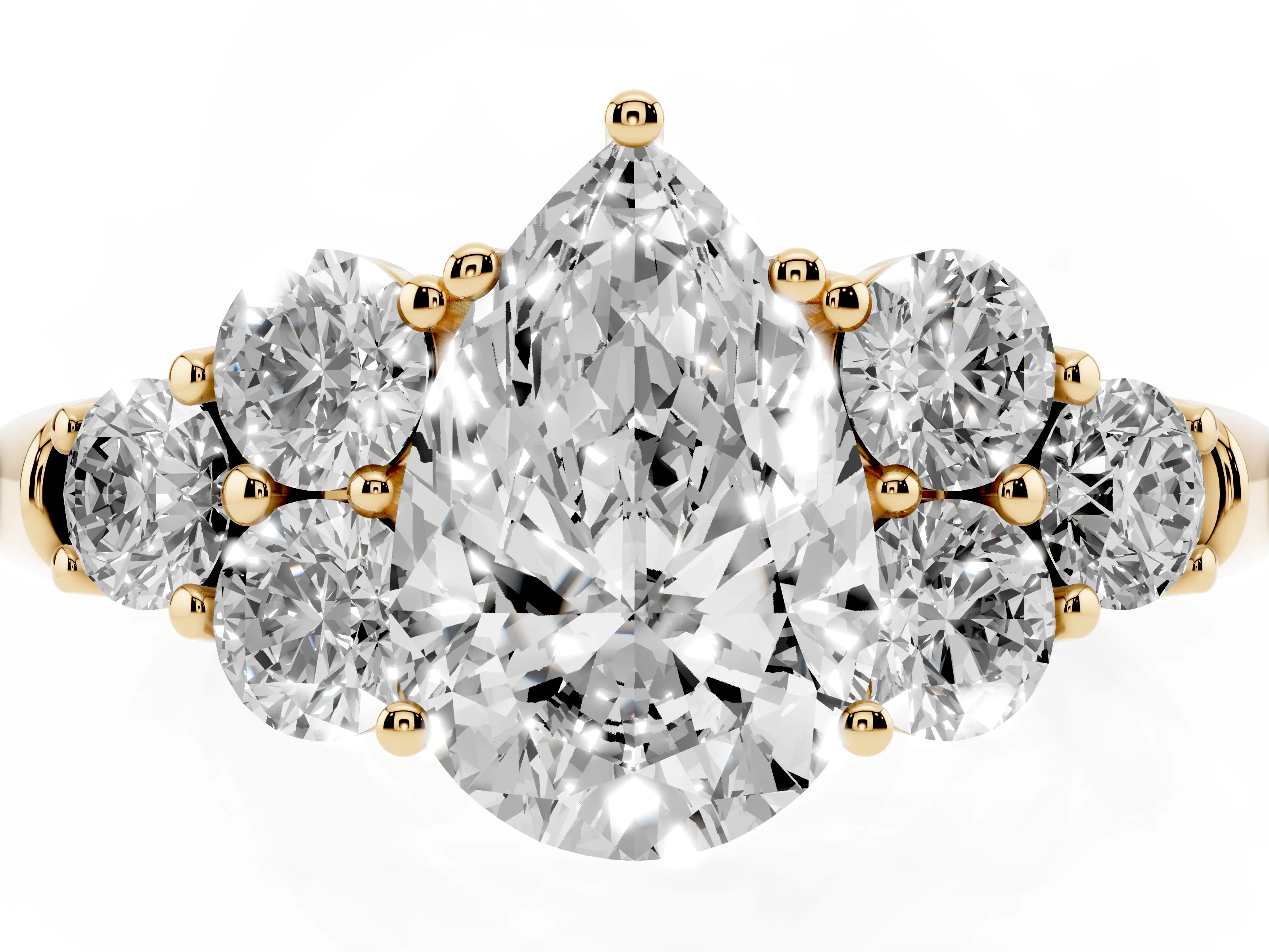 Pear Cut Diamond Cluster Ring Set in Yellow gold with Round Accent Stones and Prong Setting on a Plain Band