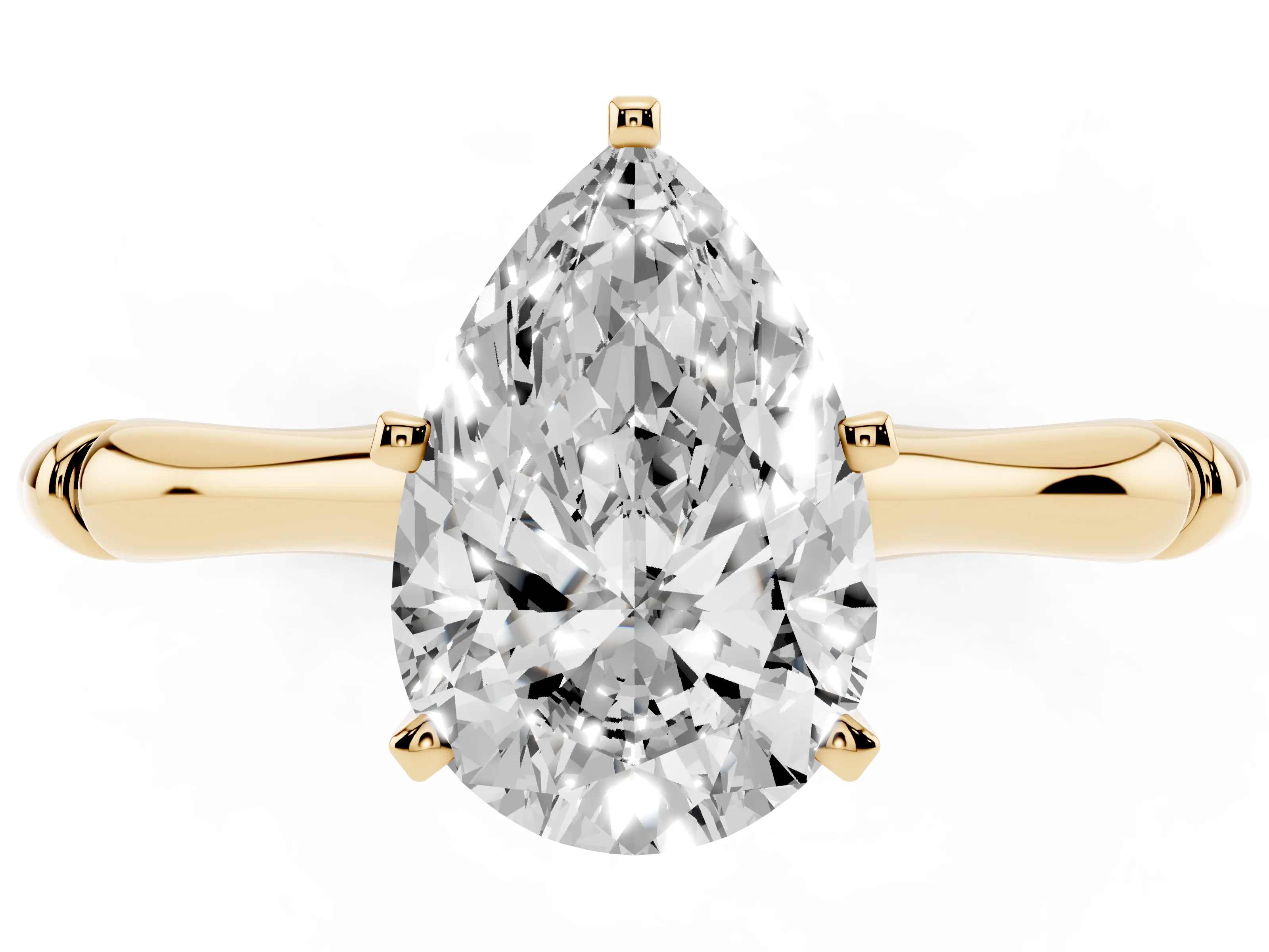 Pear Cut Diamond Solitaire Ring Set in Yellow gold with Bamboo Band and Prong Setting