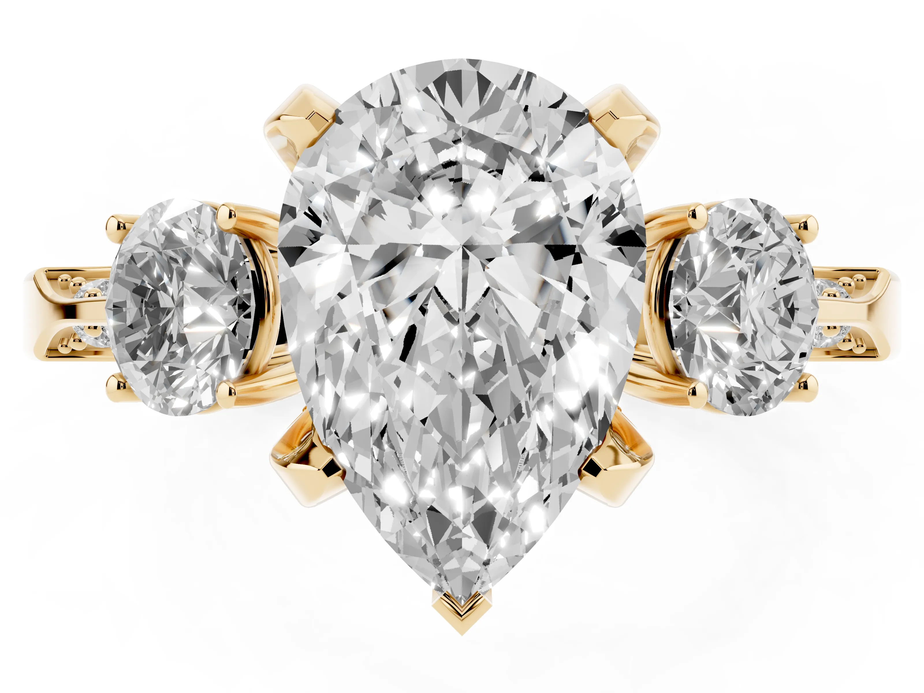 Pear Cut Diamond Three-Stone Ring Set in Yellow gold with Pavé Band and Smaller Side Stones
