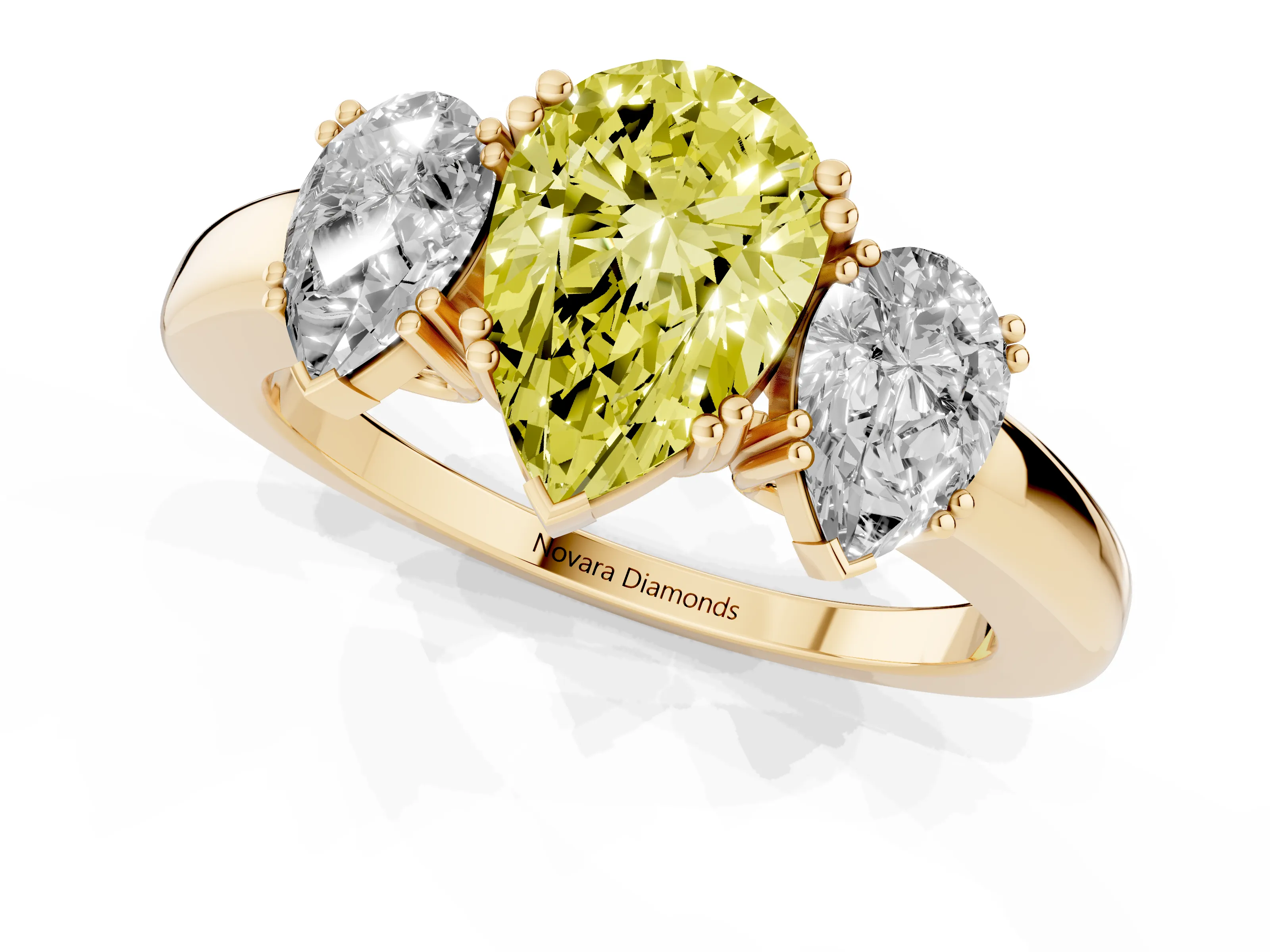 Fancy Yellow Pear Cut Diamond Three-Stone Ring Set in Yellow gold with Polished Channel-Set Band