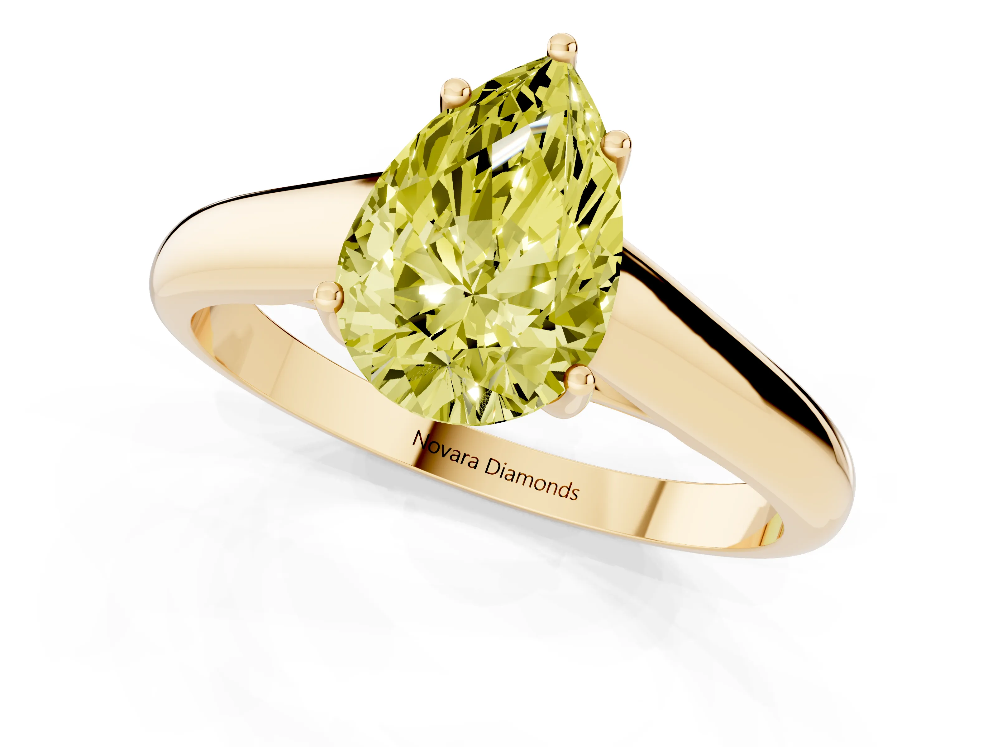 Fancy Yellow Pear Cut Diamond Solitaire Engagement Ring Set in Yellow gold with Subtly Tapered Band and Prong Setting