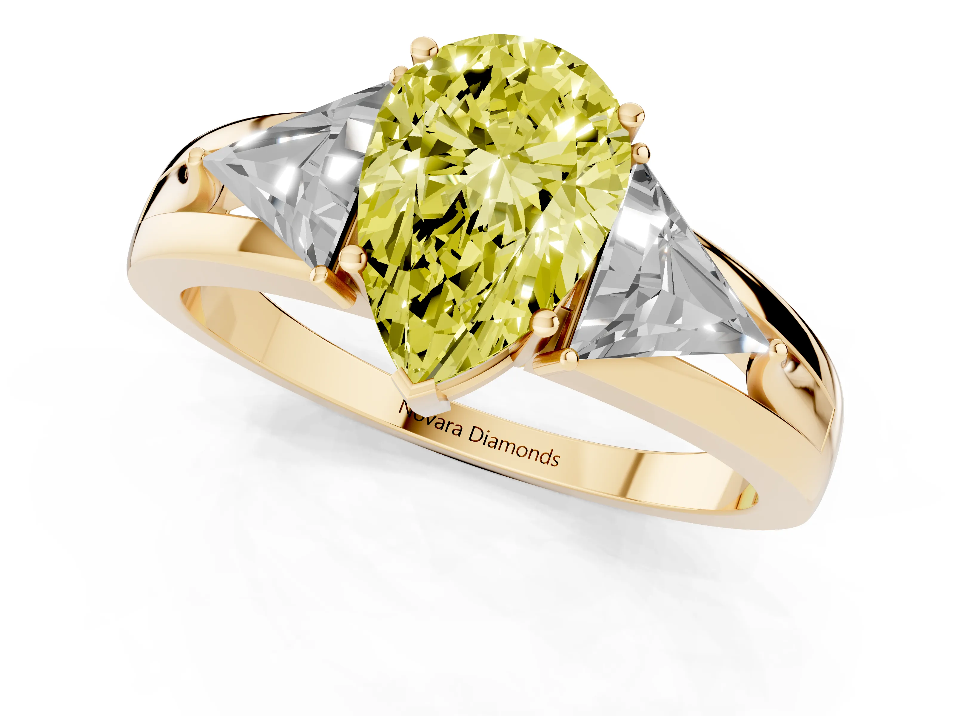 Fancy Yellow Pear Cut Diamond Three-Stone Ring Set in Yellow gold with Trillion Side Stones and Split Shank