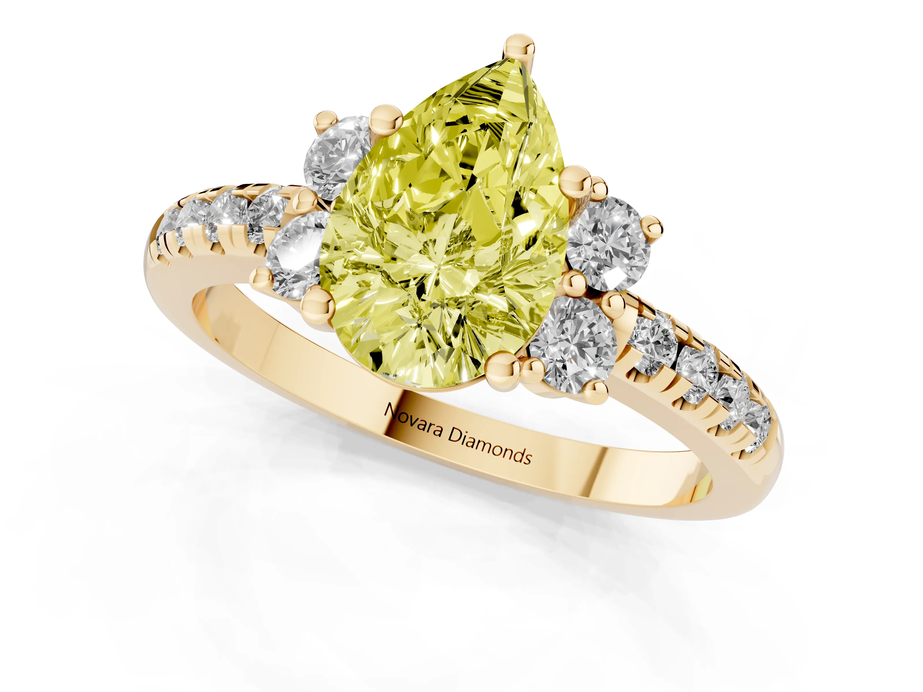 Fancy Yellow Pear Cut Diamond Three-Stone Pavé Ring Set in Yellow gold with Prong Setting