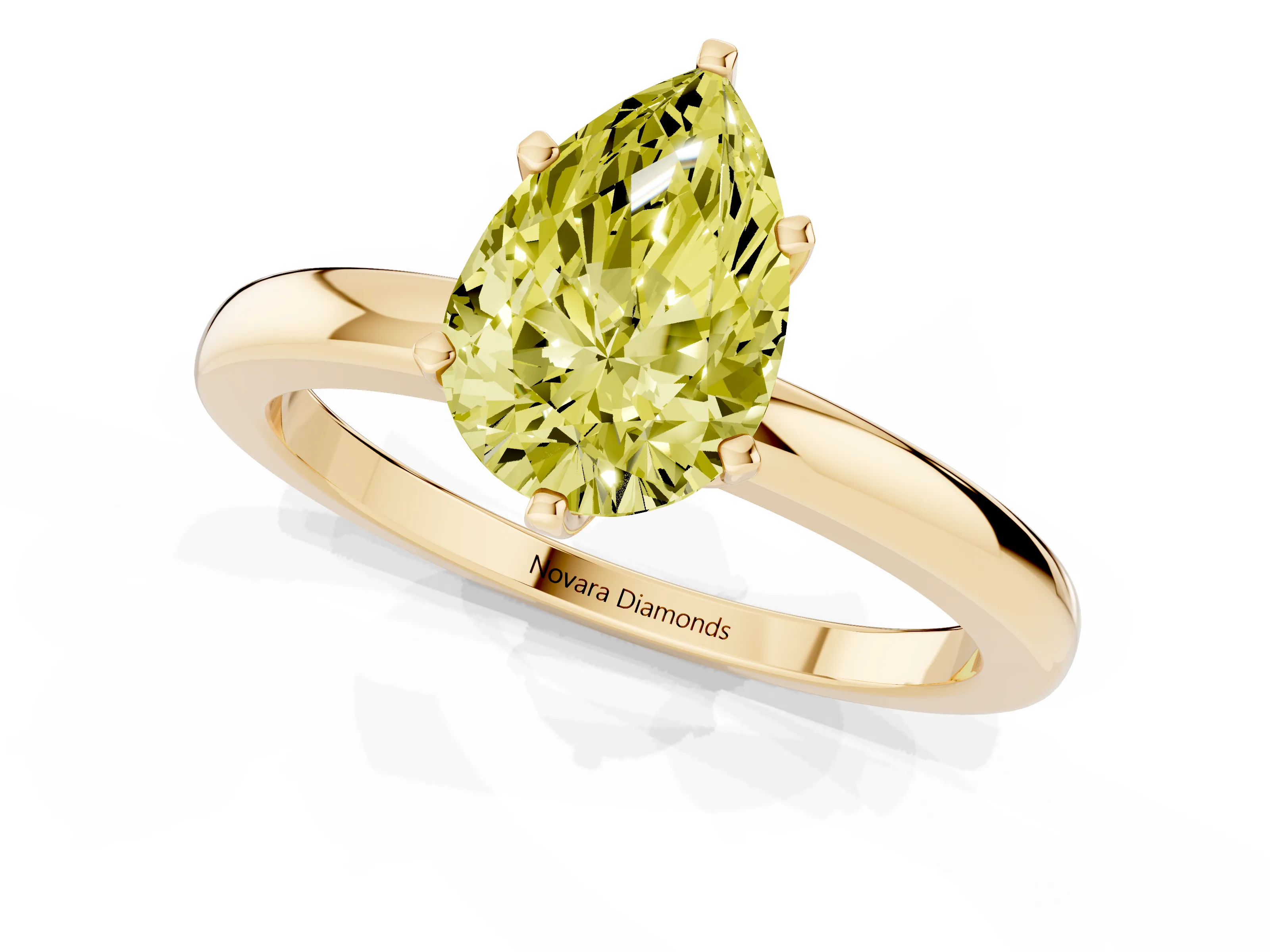Fancy Yellow Pear Cut Diamond Solitaire Ring Set in Yellow gold with Raised Prong Setting on a Classic Band
