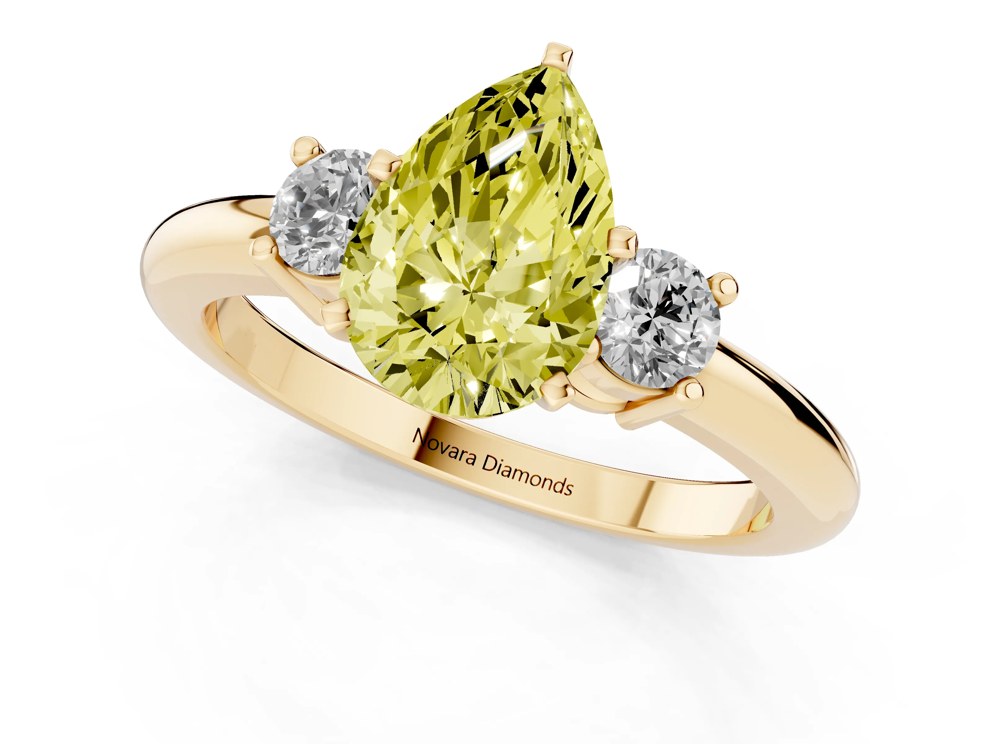 Fancy Yellow Three-Stone Pear Cut Diamond Ring Set in Yellow gold with Prong Setting and Plain Band