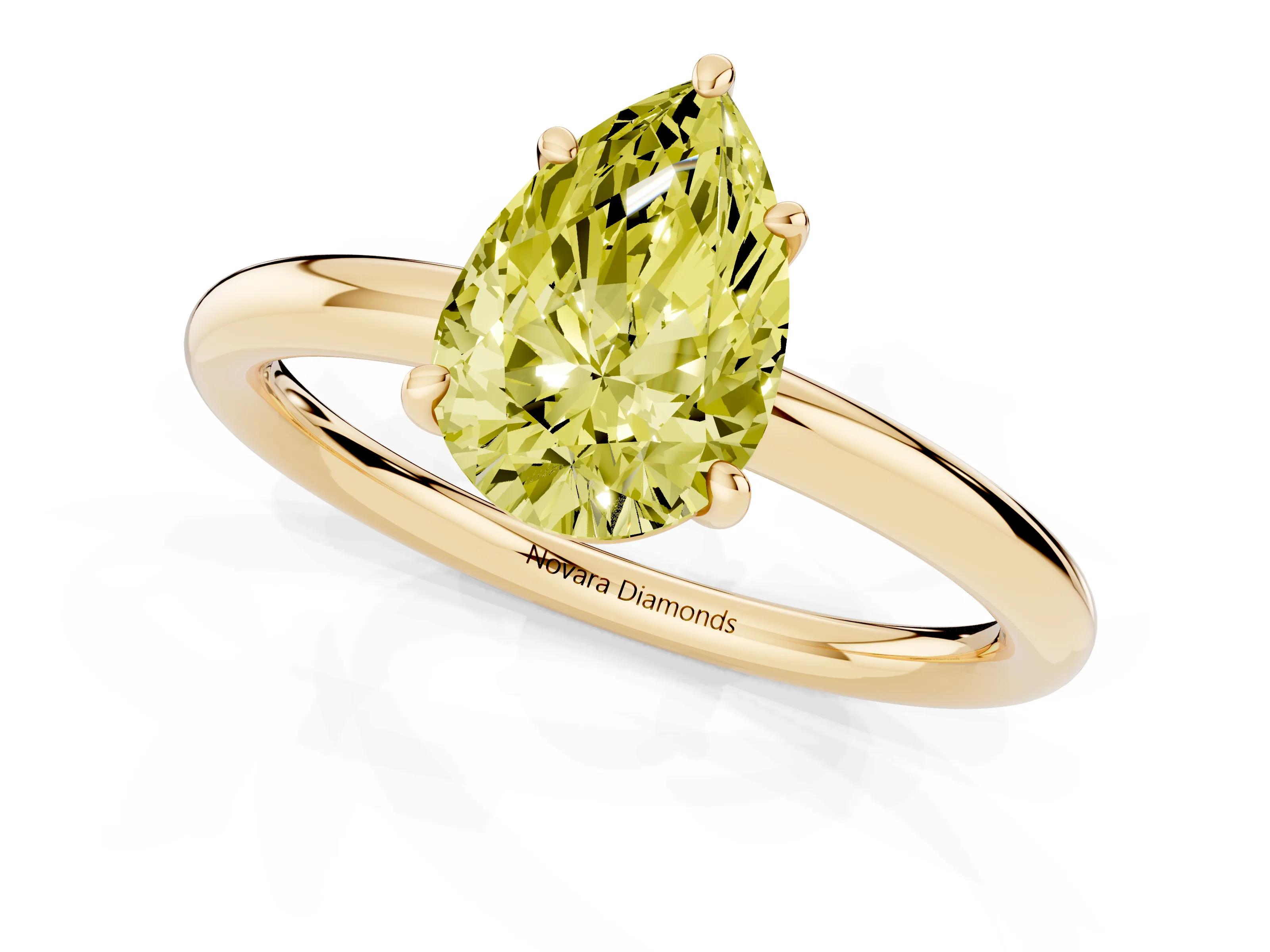 Fancy Yellow Pear Cut Diamond Solitaire Ring Set in Yellow gold with Prong Setting on a Polished Plain Band