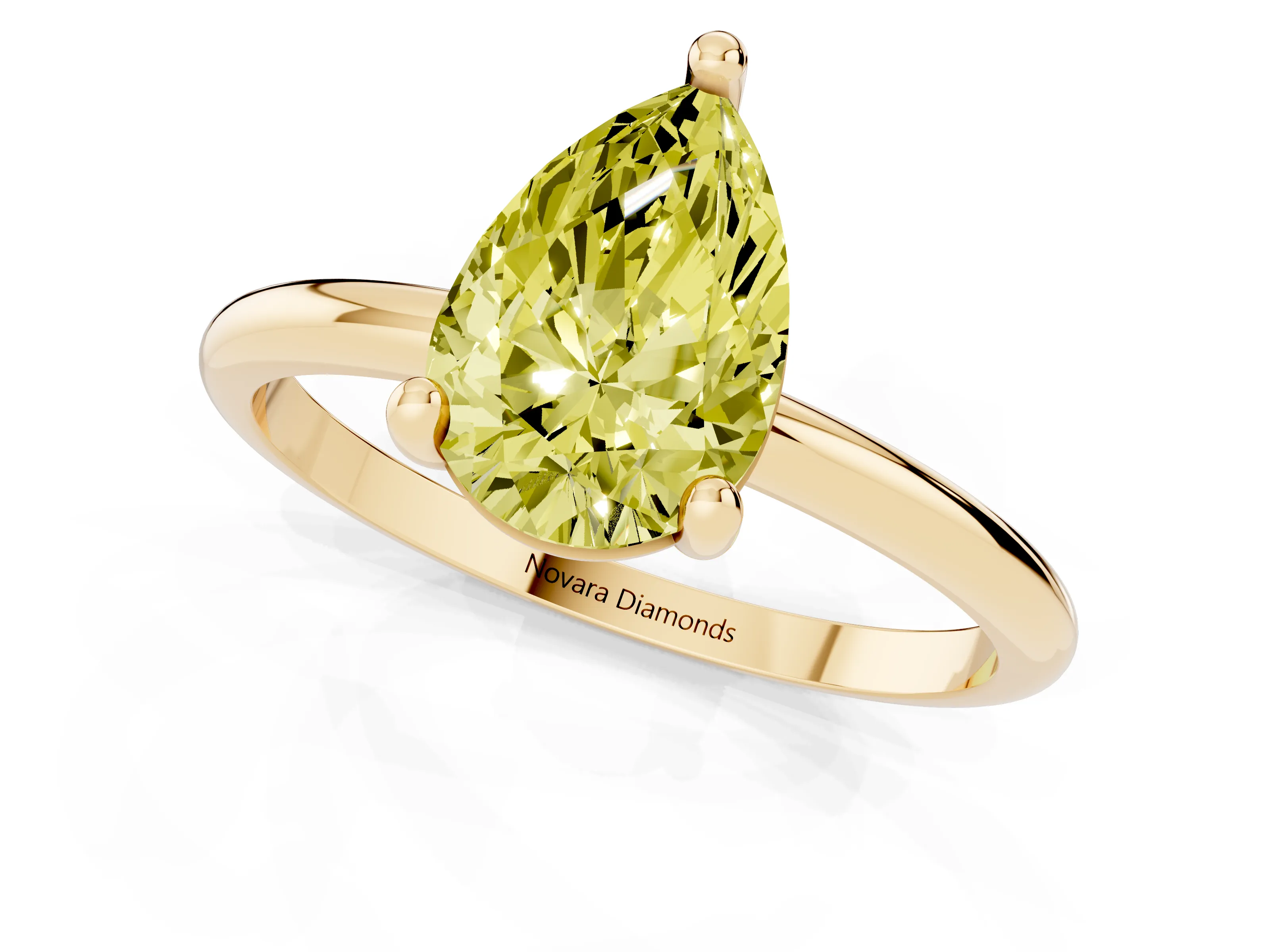 Fancy Yellow Pear Cut Diamond Solitaire Ring Set in Yellow gold with Secure Prong Setting on a Classic Band